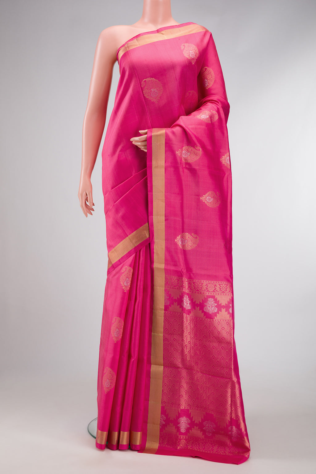 Pink Dual Tone Soft Silk Saree with Zari Butta on the body and Zari Border.  displayed on a mannequin