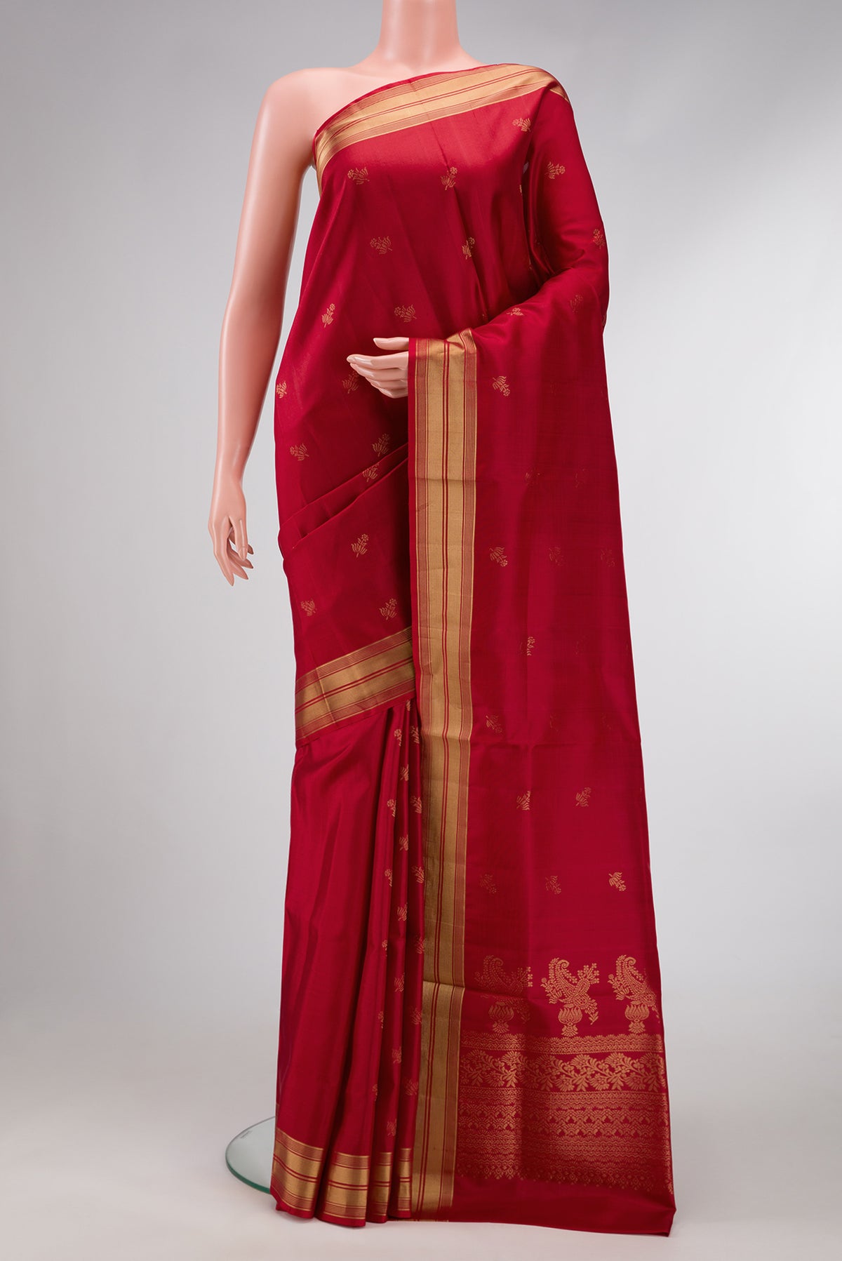 Maroon Dual Tone Soft Silk Saree with Zari Butta on the body and Zari Border.  displayed on a mannequin