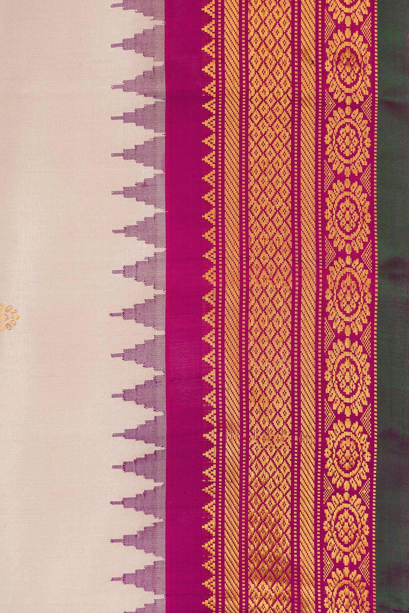 Border image of Dark Beige Dual Tone Gadwal Silk Saree with Zari Butta on the body and Zari Border. 