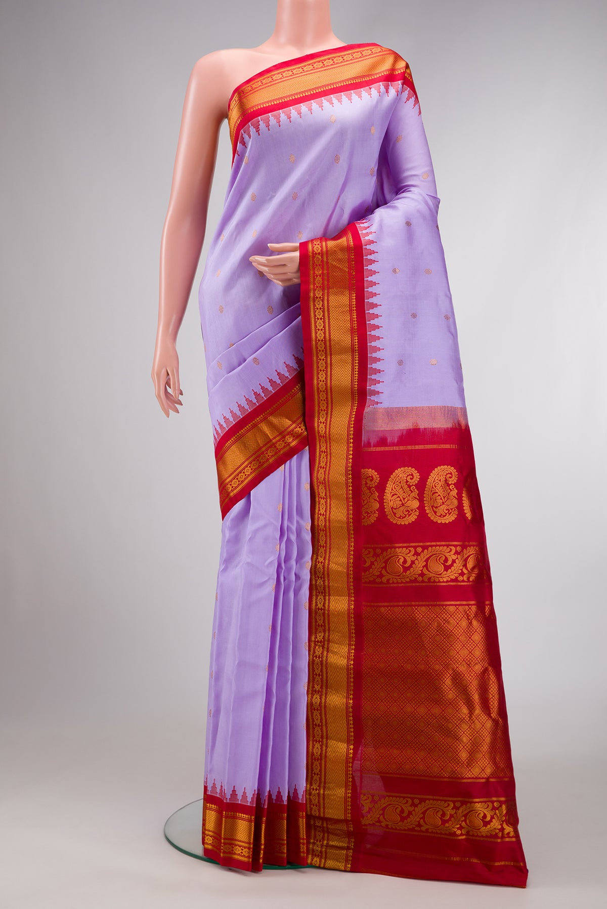 Lavender Dual Tone Gadwal Silk Saree with Zari Butta on the body and Zari Border.  displayed on a mannequin