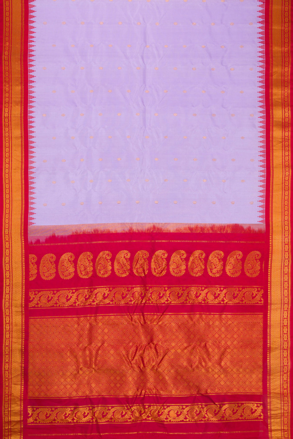 Flat view of Lavender Dual Tone Gadwal Silk Saree with Zari Butta on the body and Zari Border. 