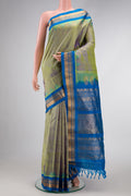 Mehandi Green Dual Tone Gadwal Silk Saree with Zari Butta on the body and Zari Border.  displayed on a mannequin
