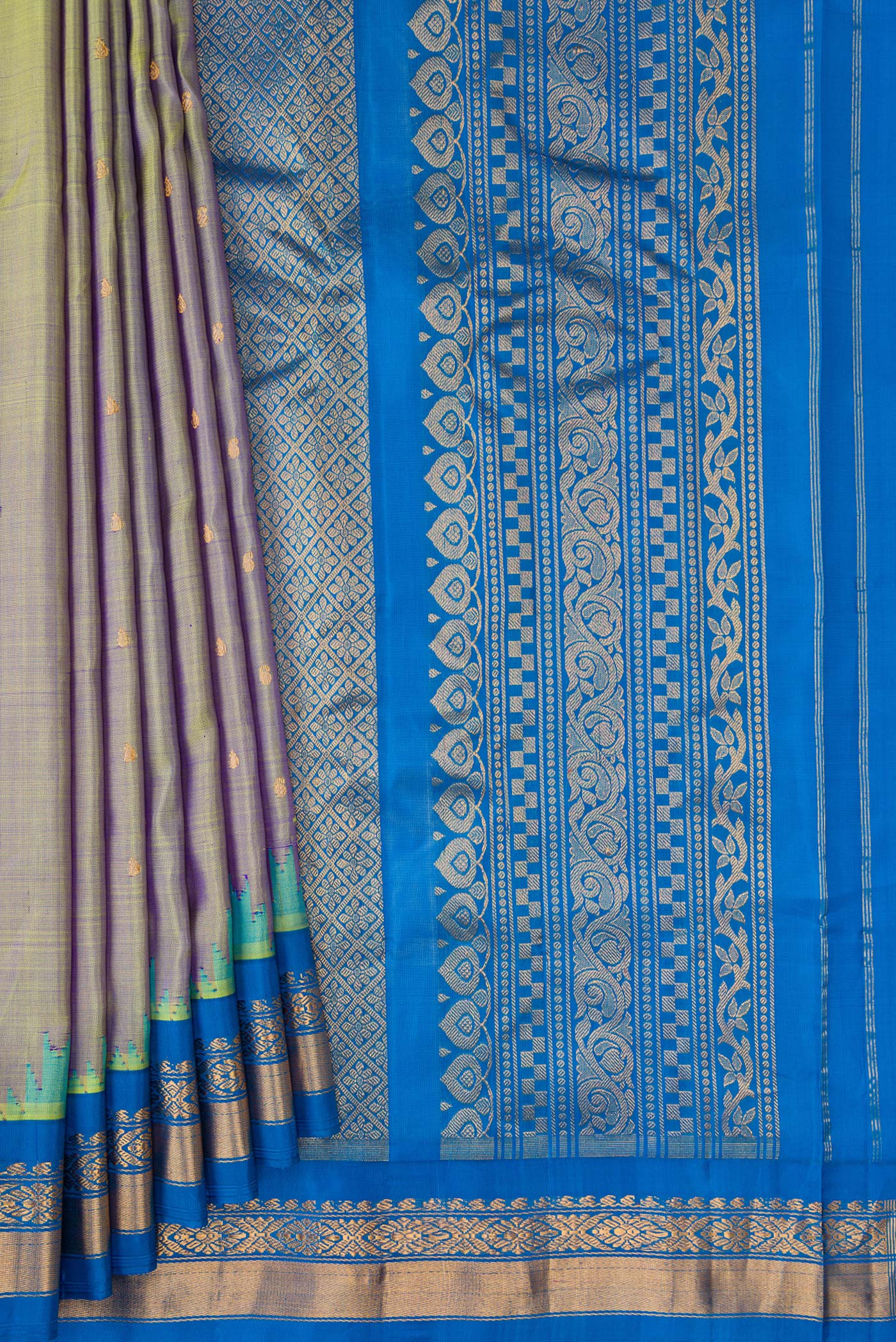 Pleats and pallu of Mehandi Green Dual Tone Gadwal Silk Saree with Zari Butta on the body and Zari Border. 