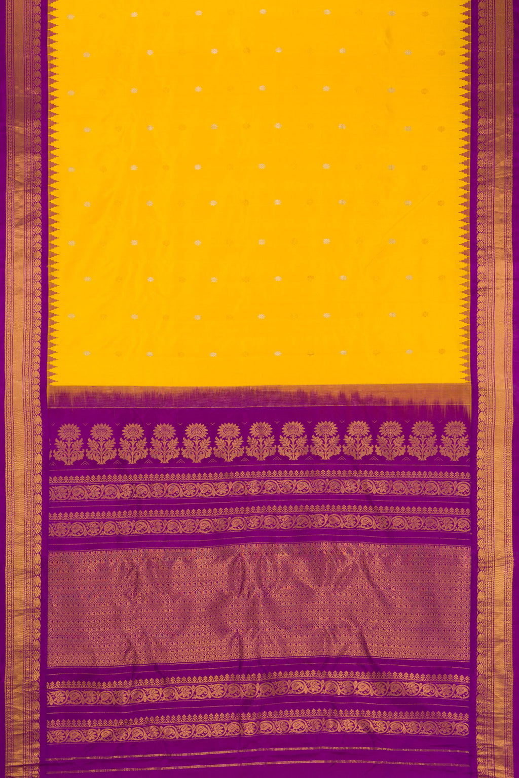 Flat view of Mustard Dual Tone Gadwal Silk Saree with Zari Butta on the body and Zari Border. 