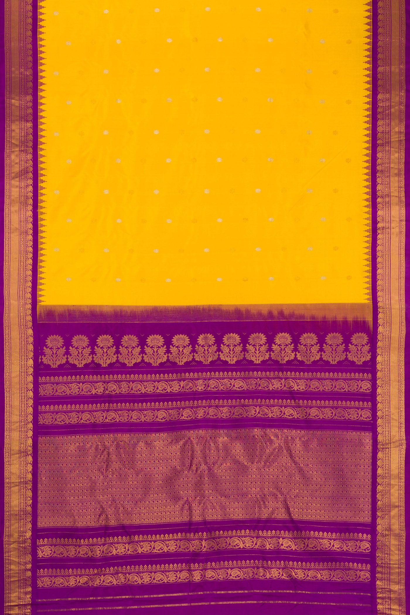 Flat view of Mustard Dual Tone Gadwal Silk Saree with Zari Butta on the body and Zari Border. 