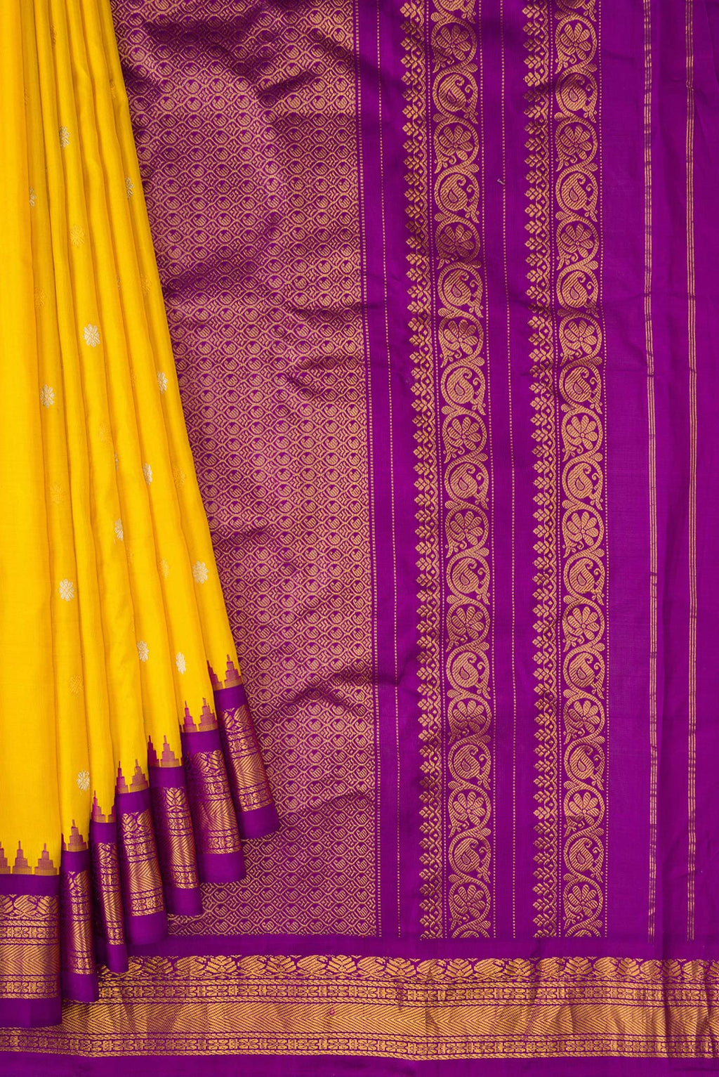 Pleats and pallu of Mustard Dual Tone Gadwal Silk Saree with Zari Butta on the body and Zari Border. 