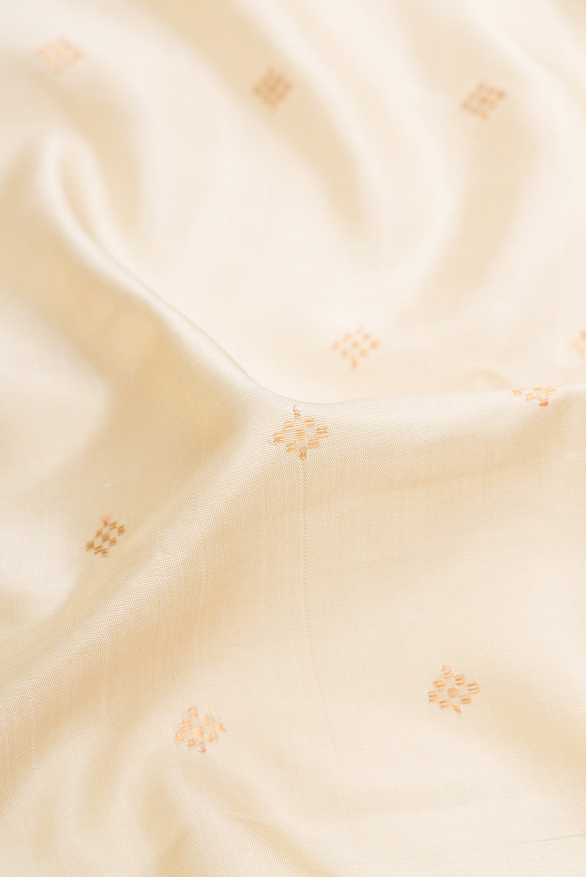 Close up of Sandal Dual Tone Gadwal Silk Saree with Zari Butta on the body and Zari Border.  displaying folds