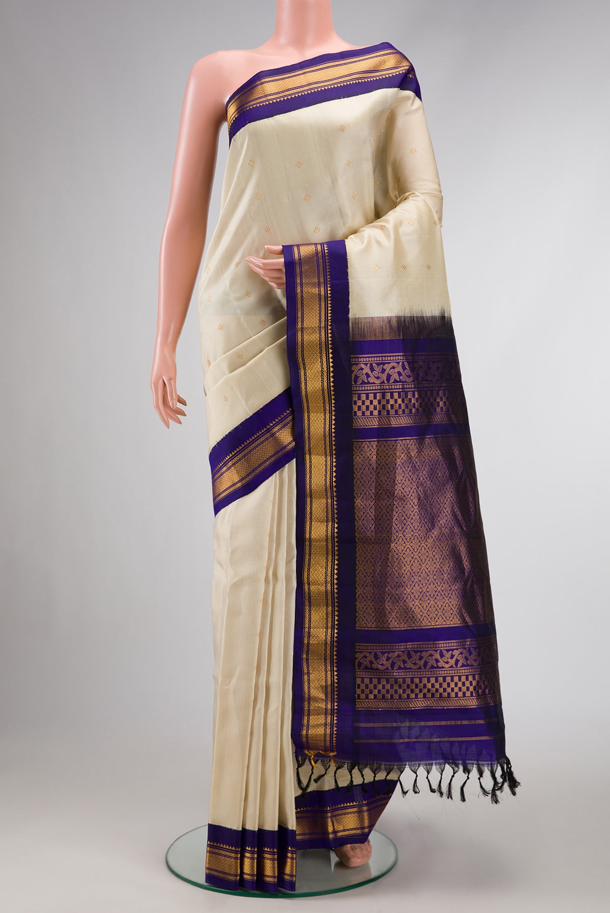 Sandal Dual Tone Gadwal Silk Saree with Zari Butta on the body and Zari Border.  displayed on a mannequin