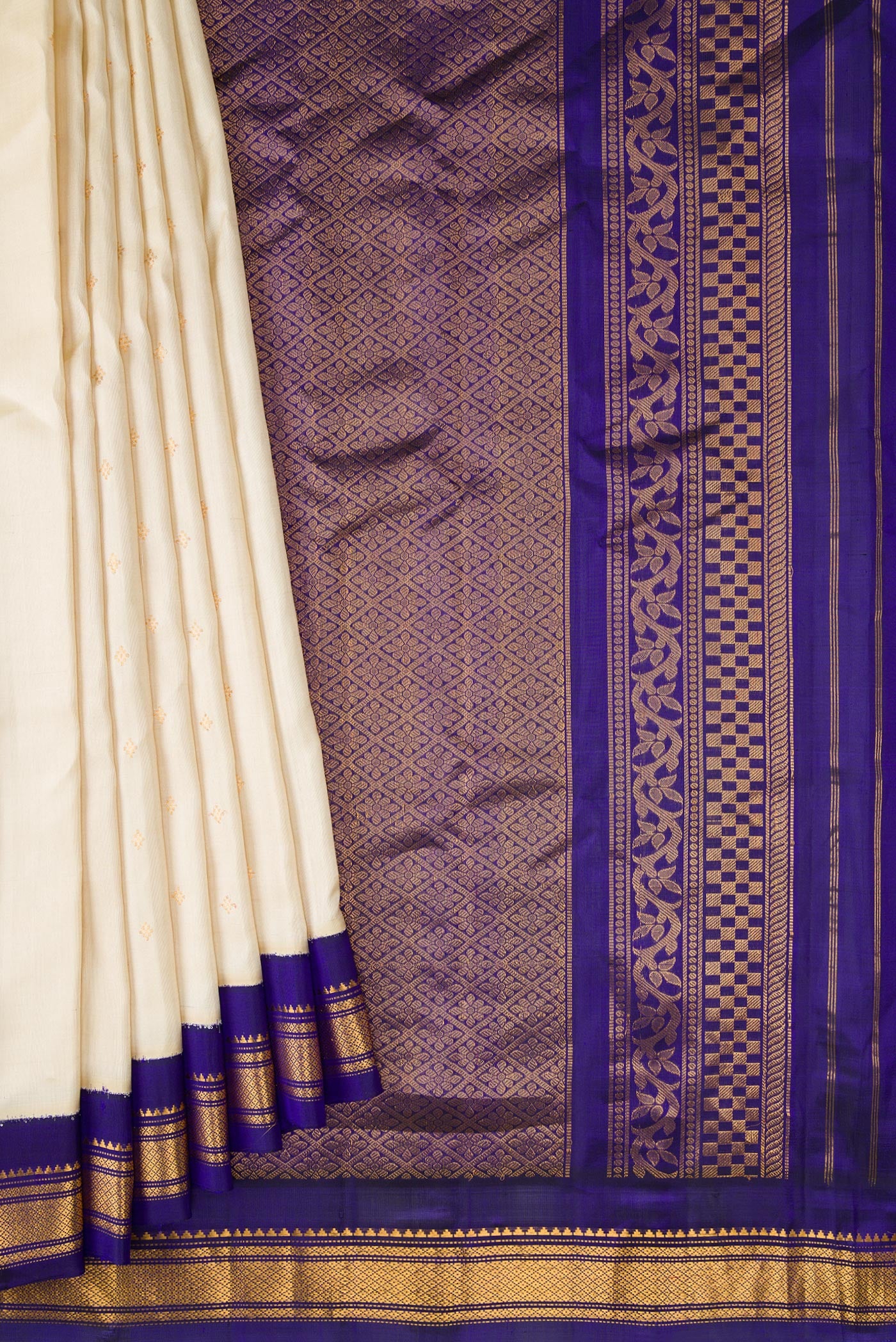 Pleats and pallu of Sandal Dual Tone Gadwal Silk Saree with Zari Butta on the body and Zari Border. 