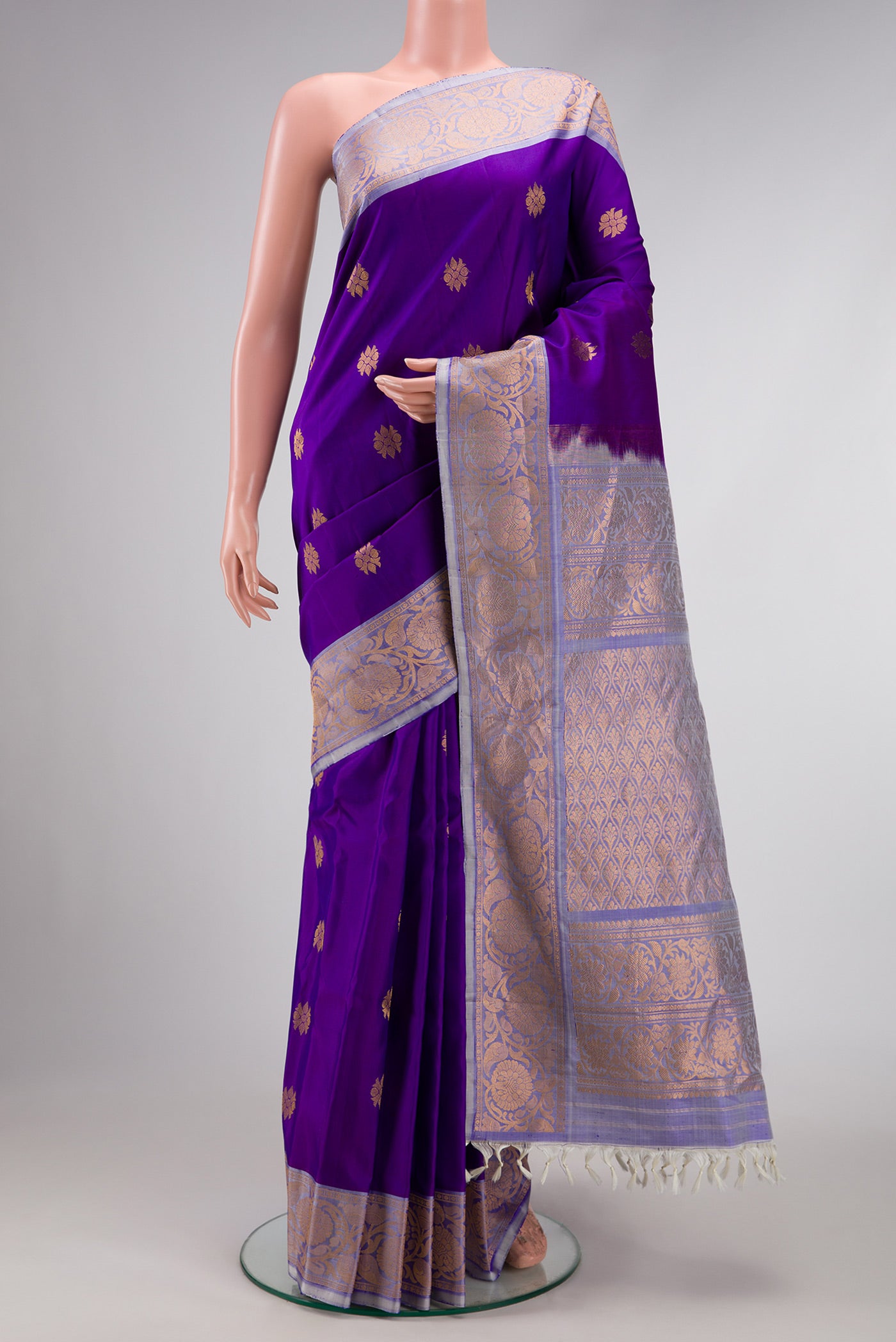 Violet Dual Tone Gadwal Silk Saree with Zari Butta on the body and Fancy Border.  displayed on a mannequin