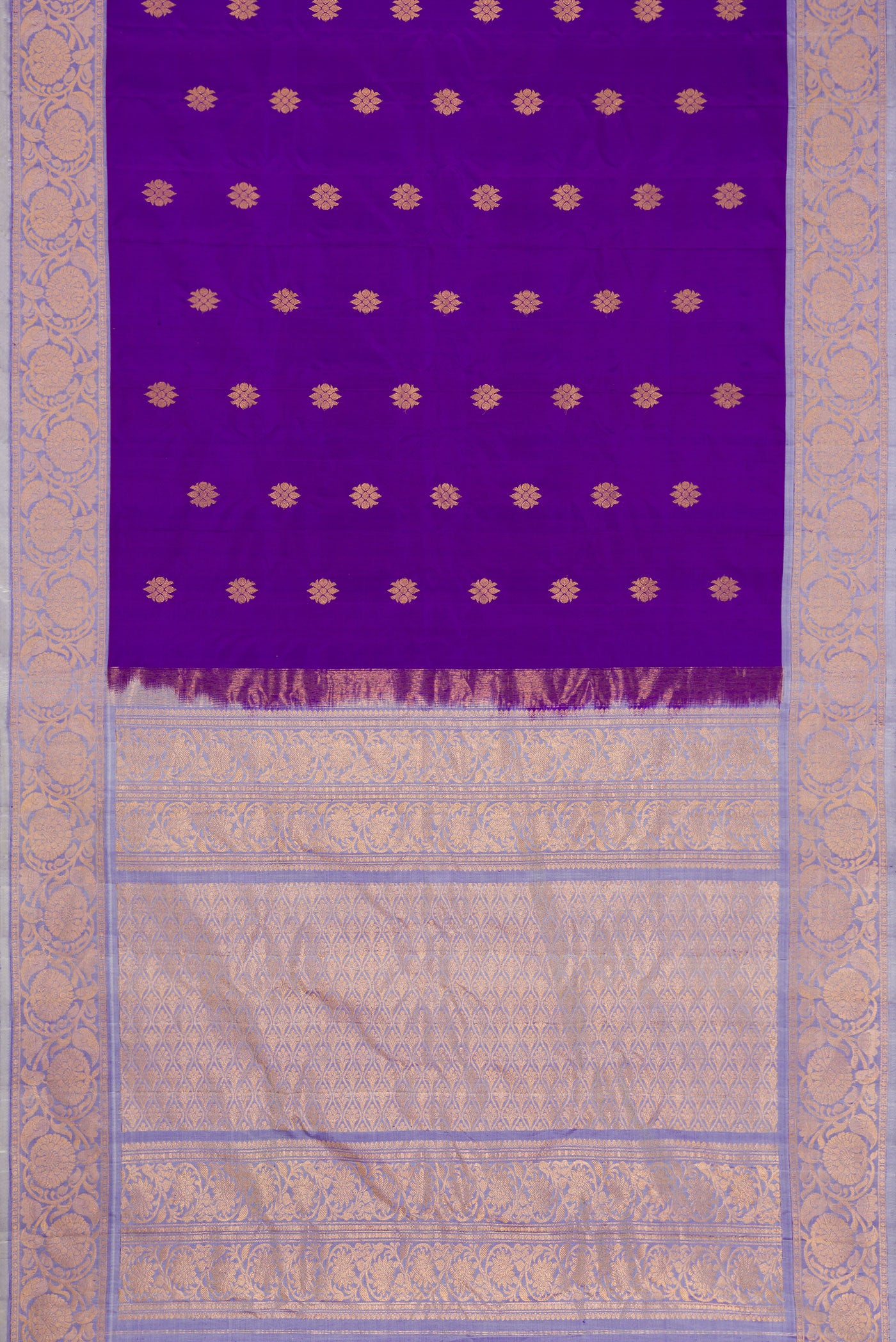 Flat view of Violet Dual Tone Gadwal Silk Saree with Zari Butta on the body and Fancy Border. 