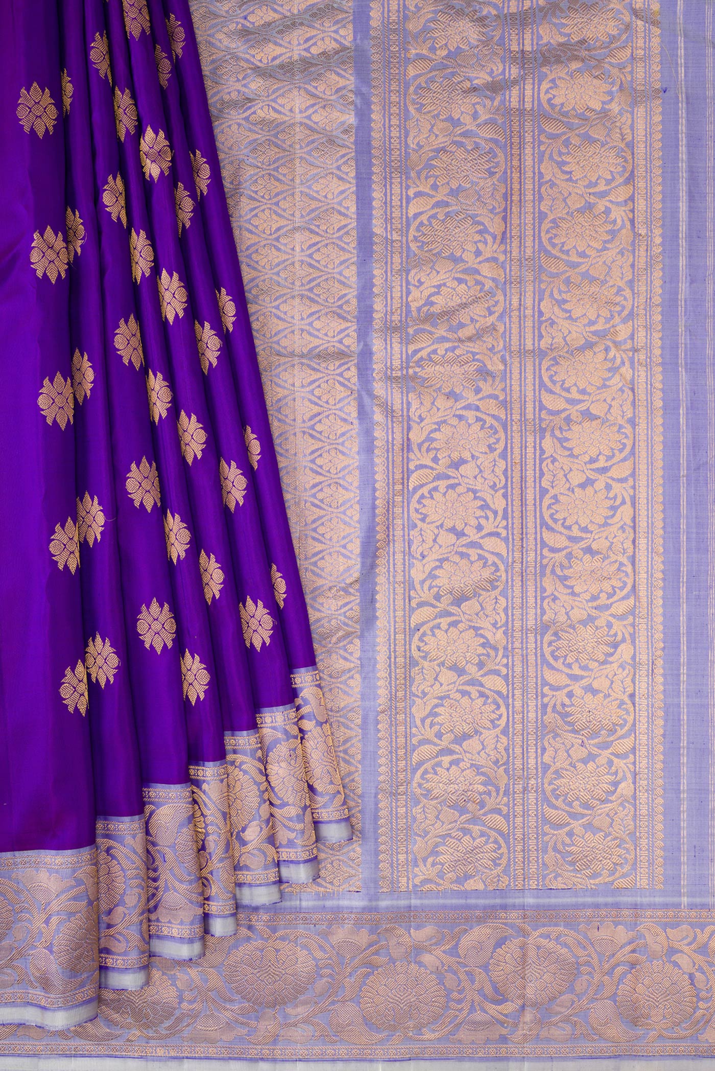 Pleats and pallu of Violet Dual Tone Gadwal Silk Saree with Zari Butta on the body and Fancy Border. 