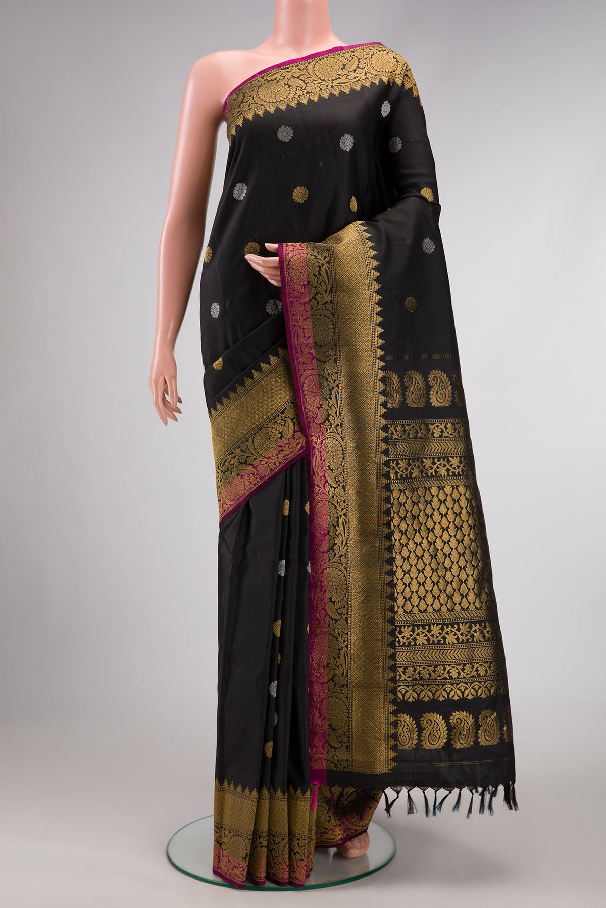 Black Dual Tone Gadwal Silk Saree with Zari Butta on the body and Zari Border.  displayed on a mannequin