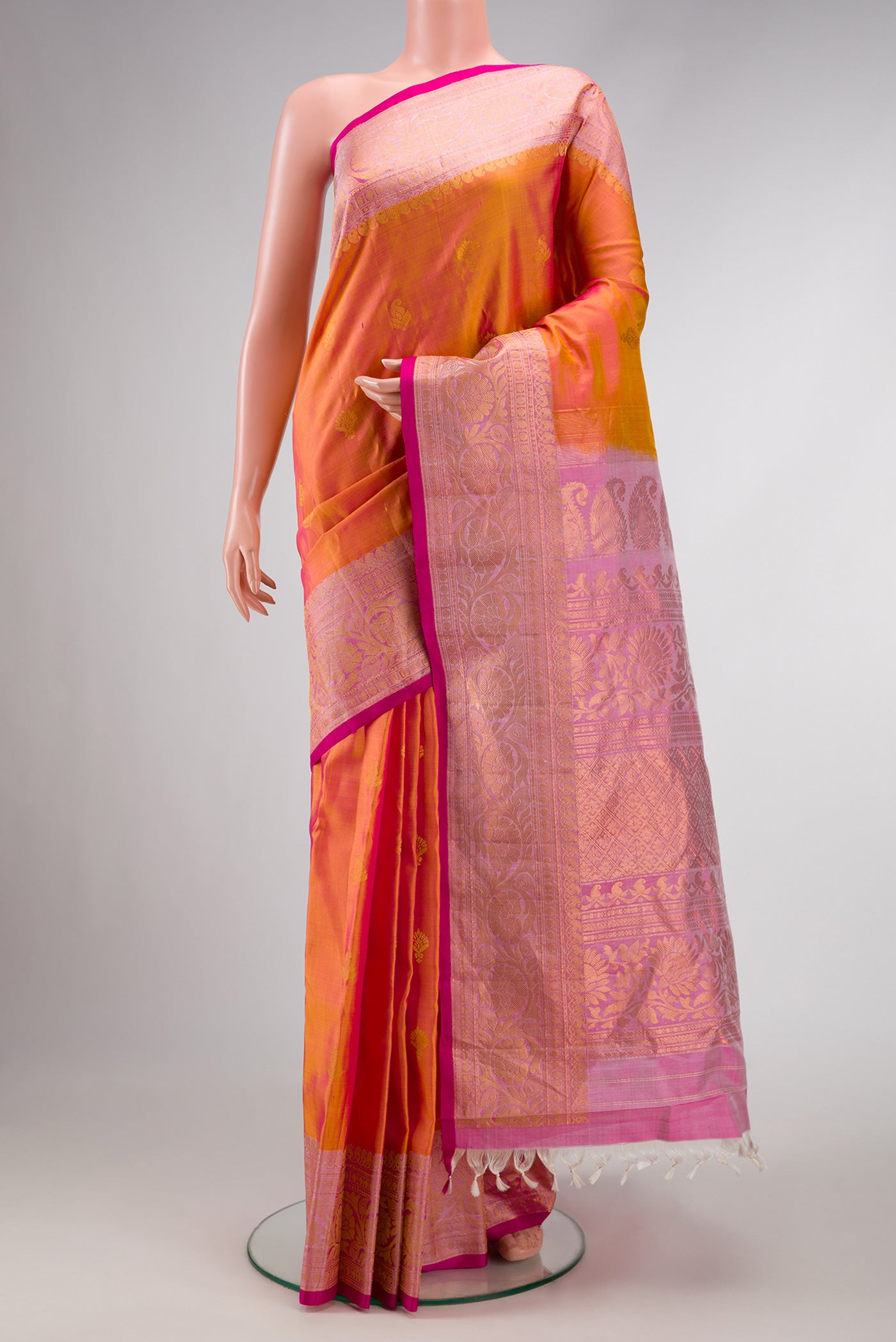 Coral Dual Tone Gadwal Silk Saree with Zari Butta on the body and Zari Border.  displayed on a mannequin