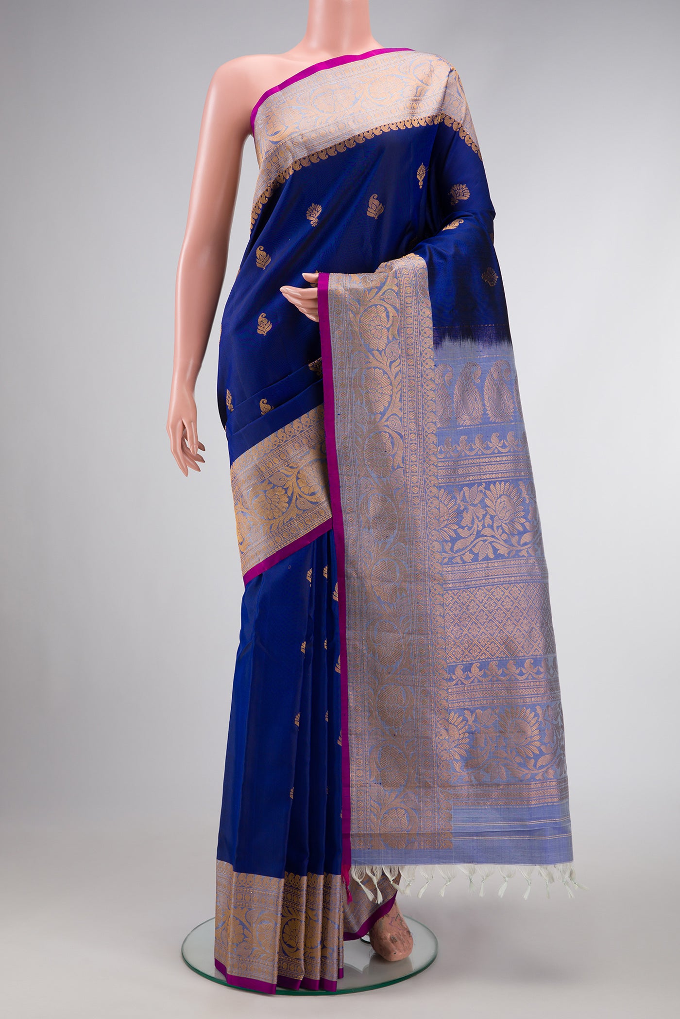 Royal Blue Dual Tone Gadwal Silk Saree with Zari Butta on the body and Zari Border.  displayed on a mannequin