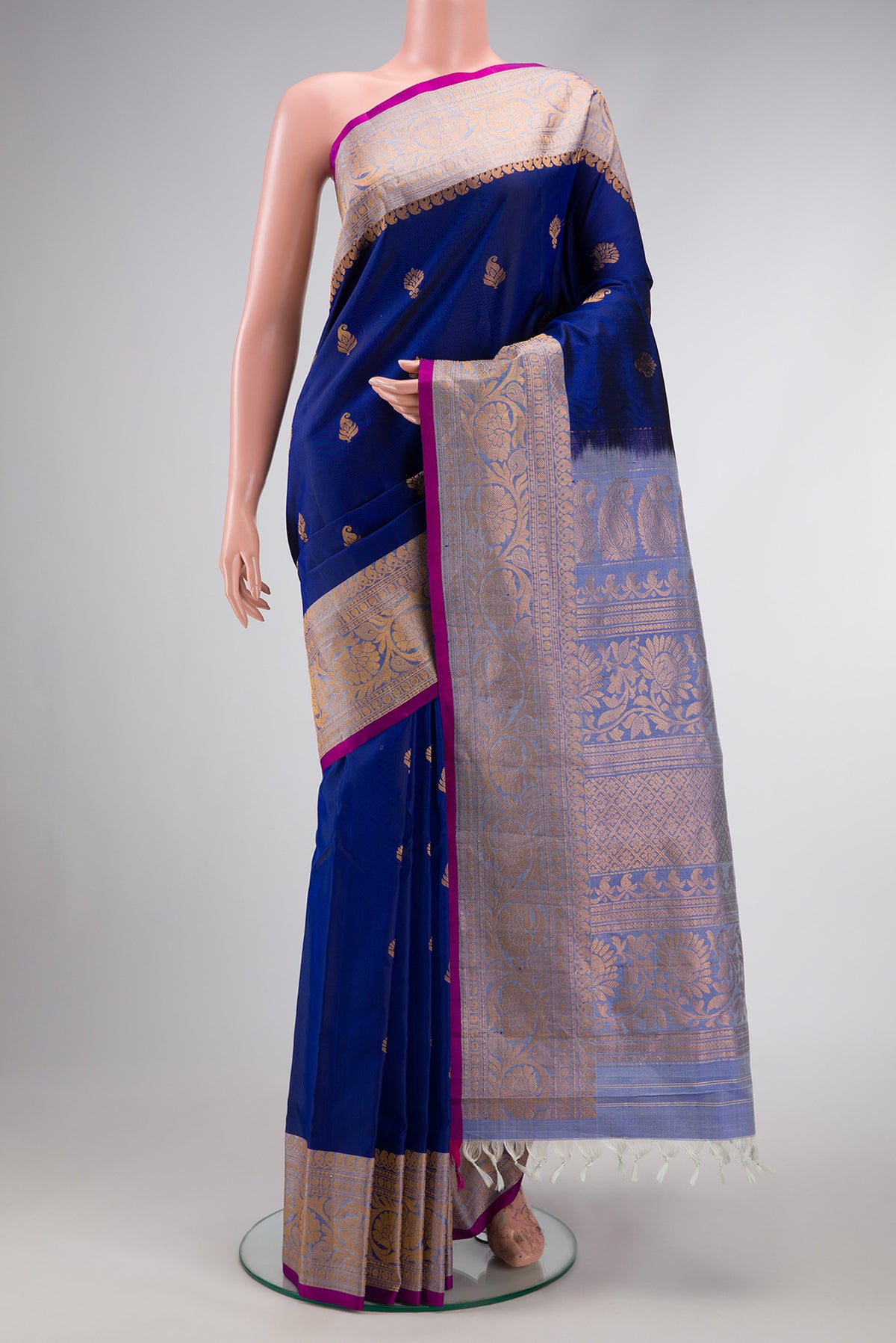 Royal Blue Dual Tone Gadwal Silk Saree with Zari Butta on the body and Zari Border.  displayed on a mannequin