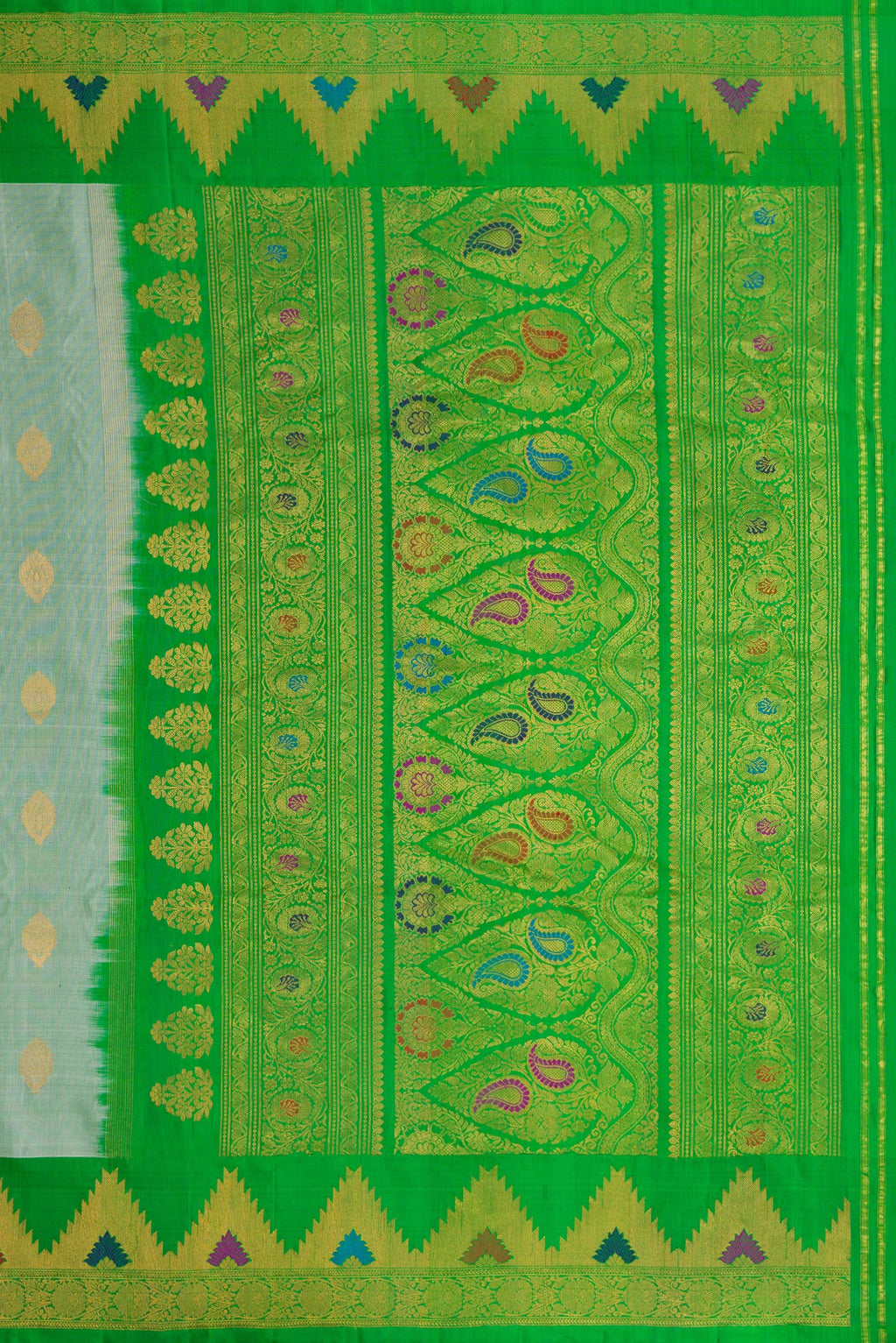 Close up image of the pallu of Light Green Dual Tone Gadwal Silk Saree with Zari Butta on the body and Zari Border. 