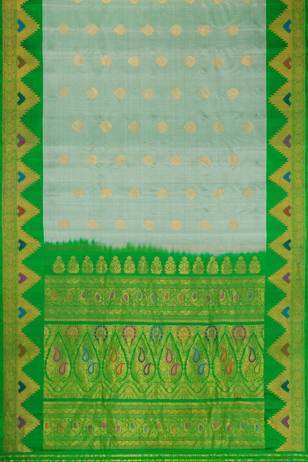 Flat view of Light Green Dual Tone Gadwal Silk Saree with Zari Butta on the body and Zari Border. 