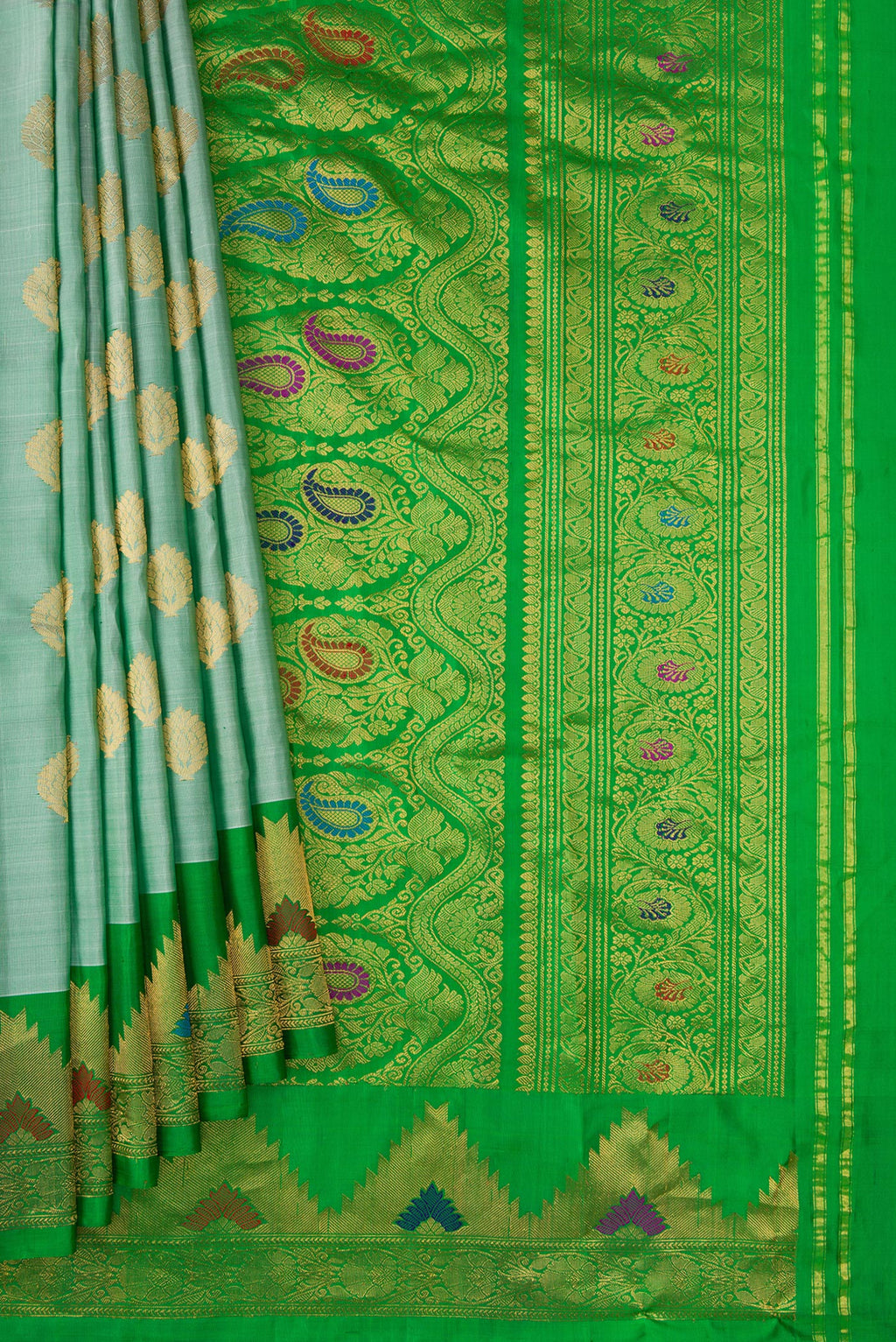 Pleats and pallu of Light Green Dual Tone Gadwal Silk Saree with Zari Butta on the body and Zari Border. 