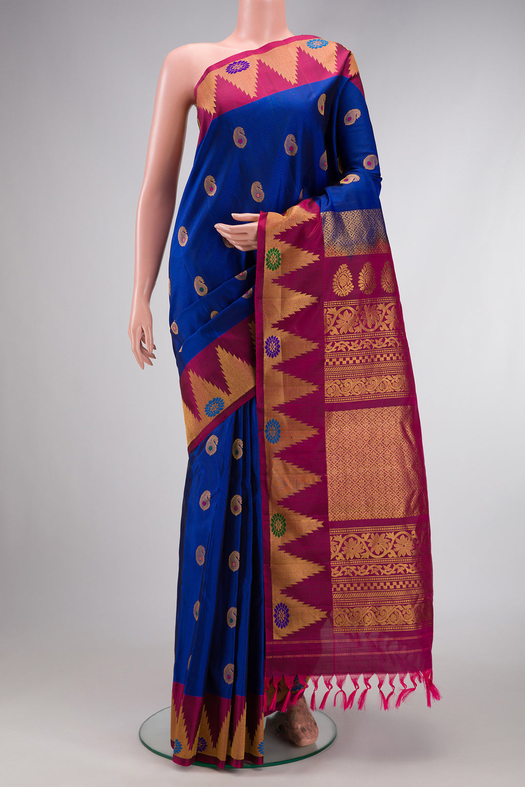 Royal Blue Dual Tone Gadwal Silk Saree with Zari Butta on the body and Zari Border.  displayed on a mannequin