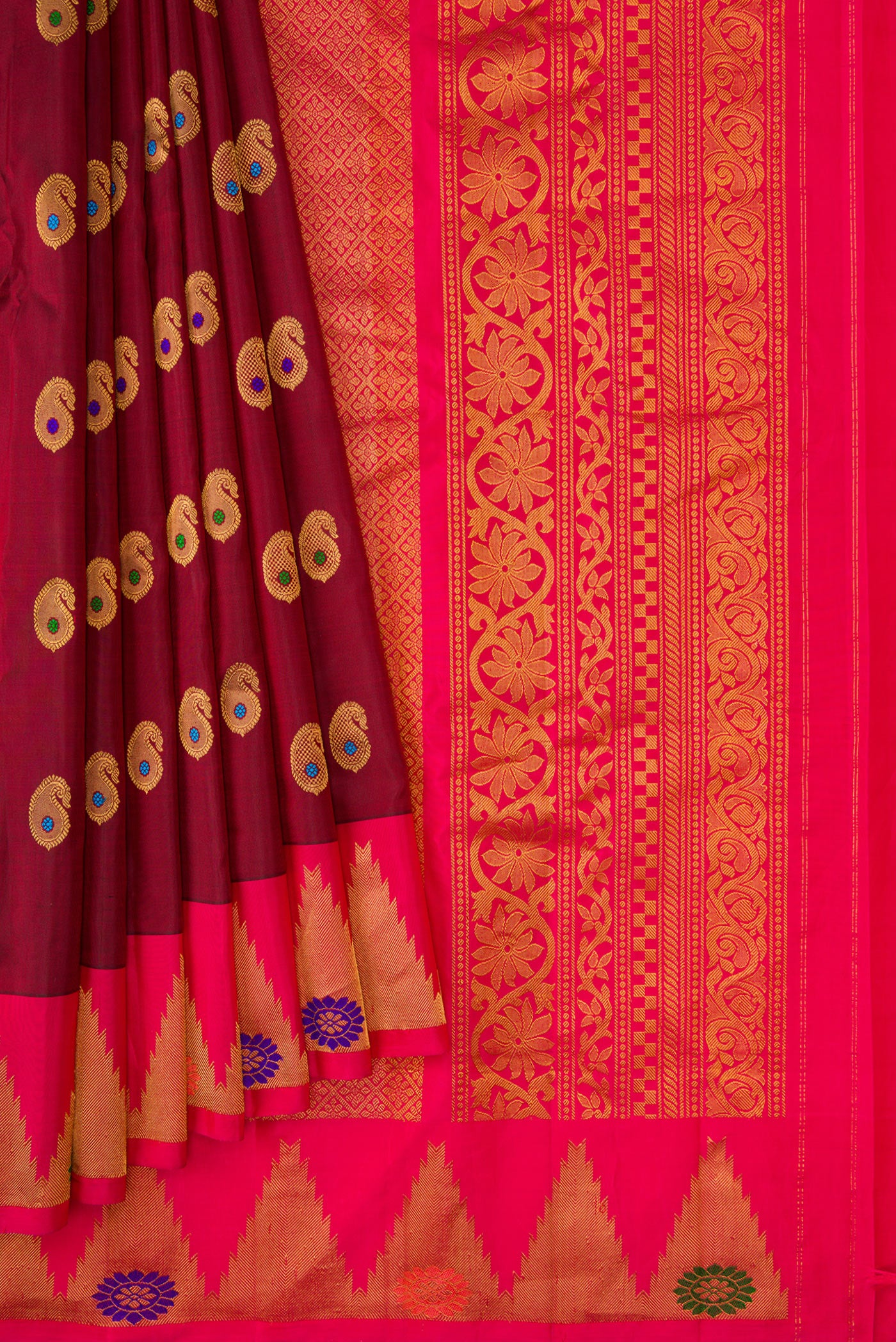 Pleats and pallu of Maroon Dual Tone Gadwal Silk Saree with Zari And Thread Butta on the body and Zari Border. 