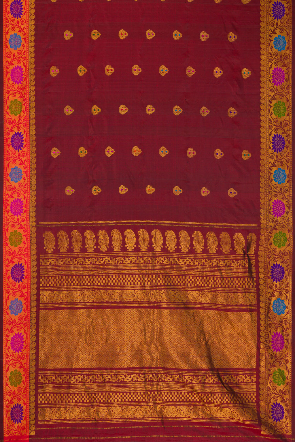 Flat view of Maroon Dual Tone Gadwal Silk Saree with Zari Butta on the body and Zari And Thread Border. 