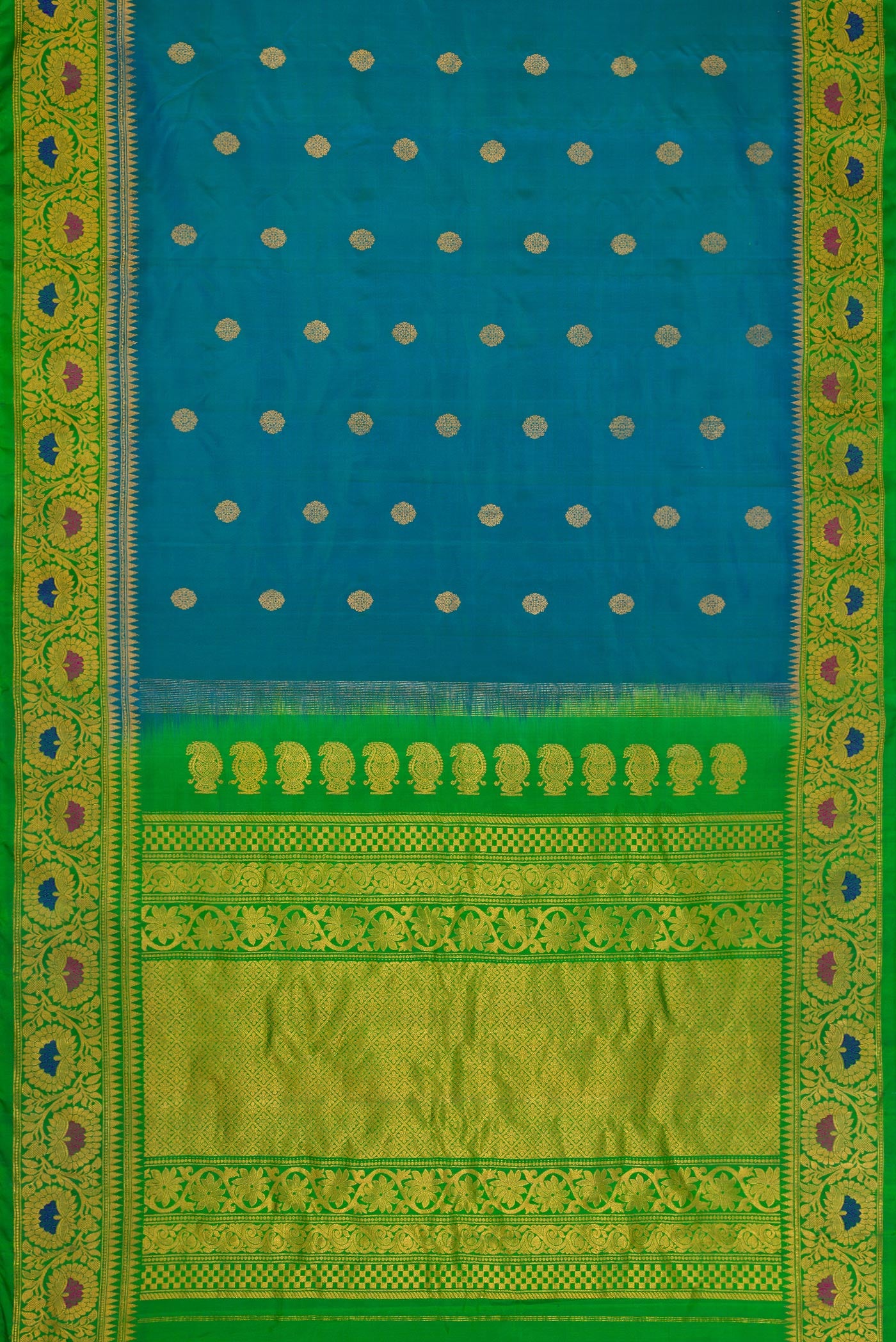Flat view of Peacock Blue Dual Tone Gadwal Silk Saree with Zari Butta on the body and Zari Border. 