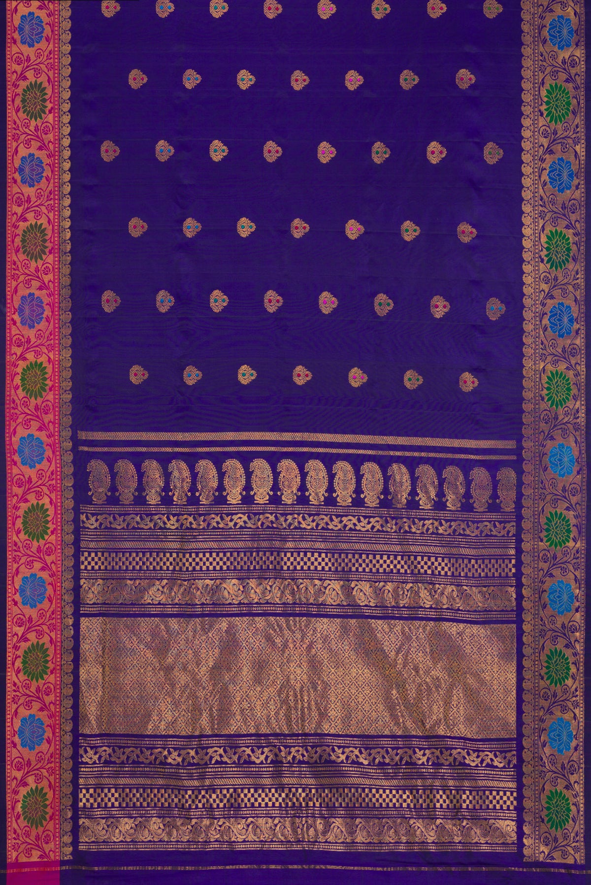 Flat view of Royal Blue Dual Tone Gadwal Silk Saree with Zari And Thread Butta on the body and Zari Border. 