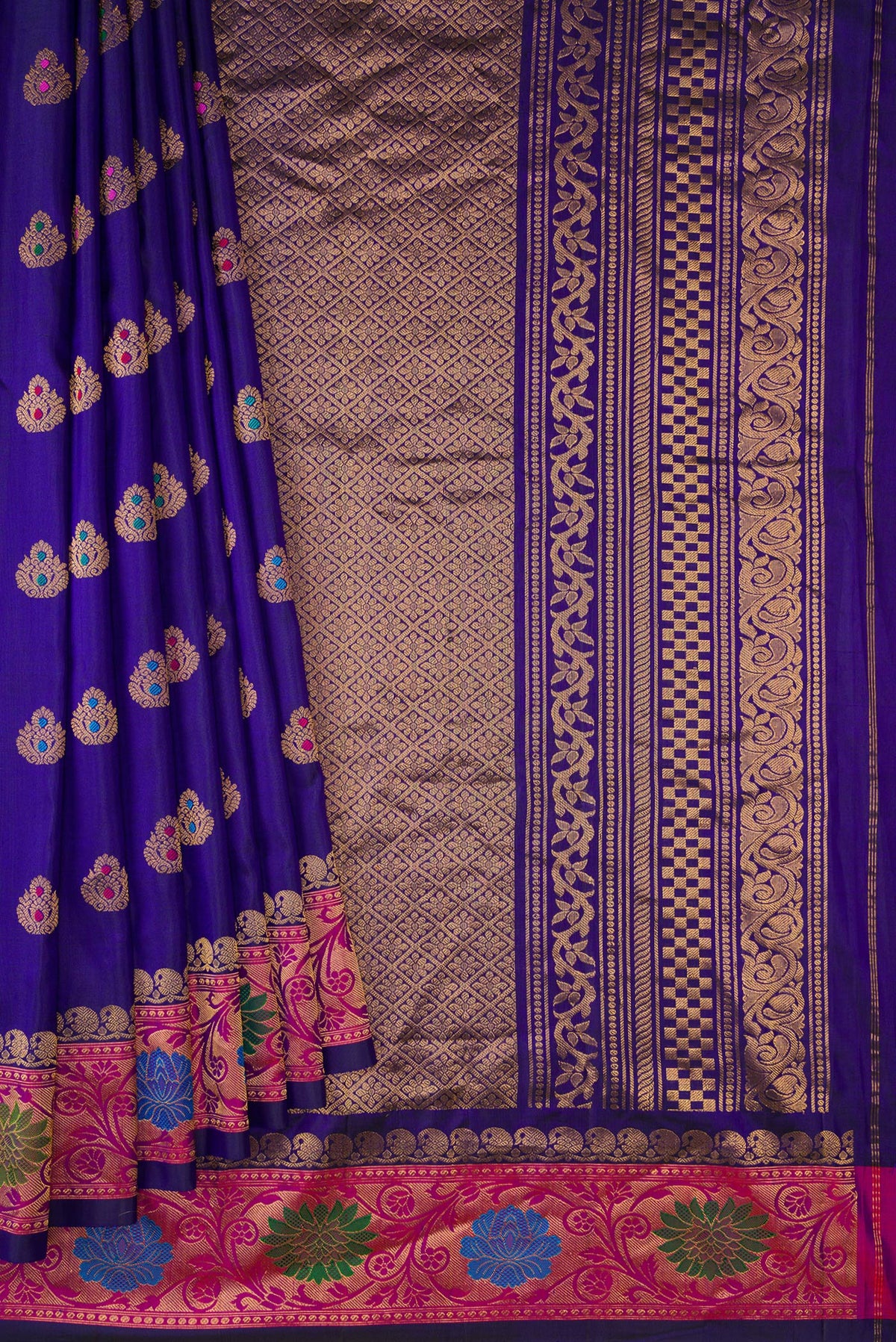Pleats and pallu of Royal Blue Dual Tone Gadwal Silk Saree with Zari And Thread Butta on the body and Zari Border. 