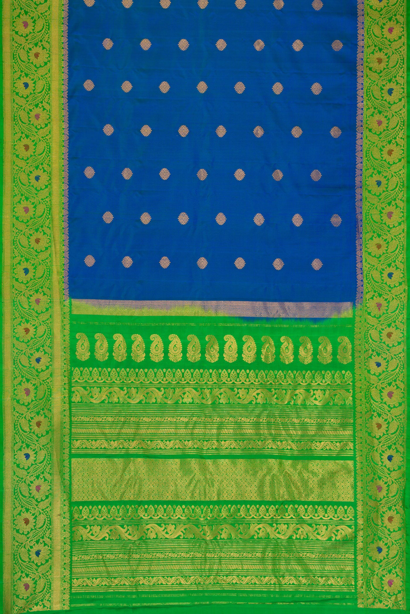 Flat view of Peacock Blue Dual Tone Gadwal Silk Saree with Zari Butta on the body and Zari Border. 