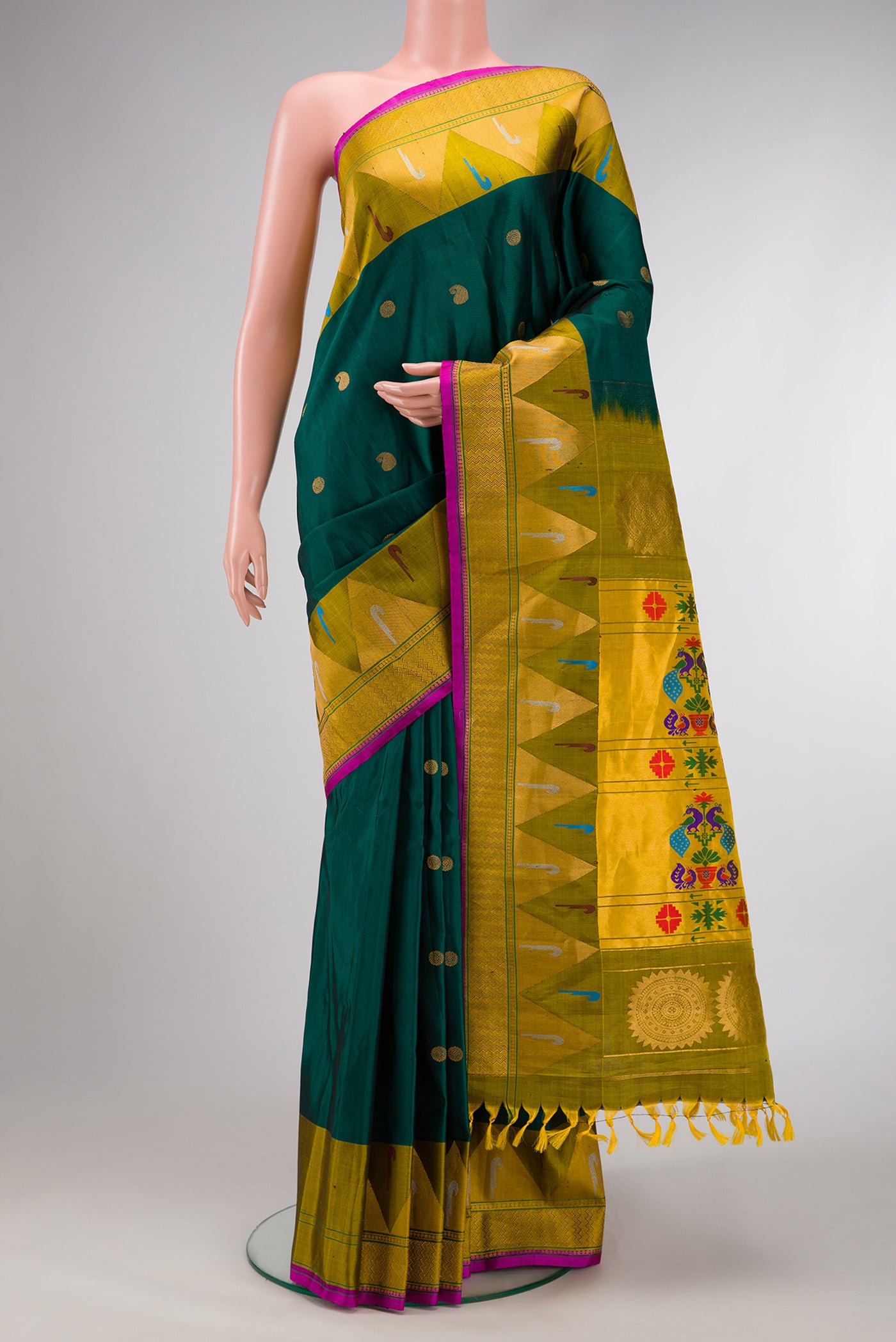 Green Dual Tone Gadwal Silk Saree with Zari Butta on the body and Paithani Border.  displayed on a mannequin