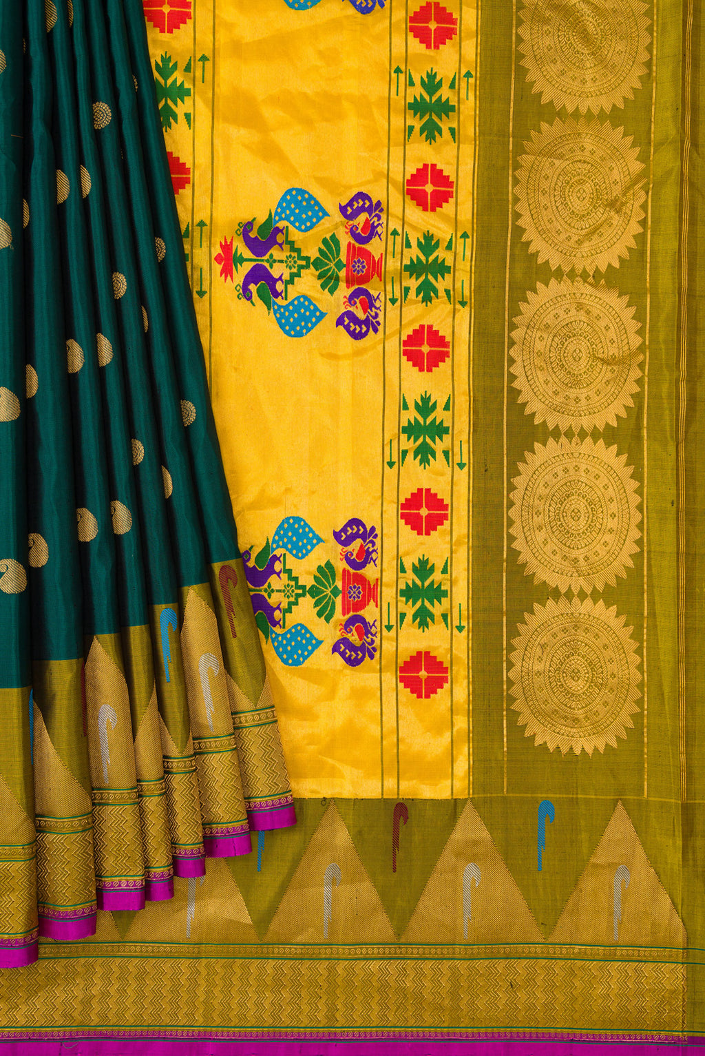 Pleats and pallu of Green Dual Tone Gadwal Silk Saree with Zari Butta on the body and Paithani Border. 