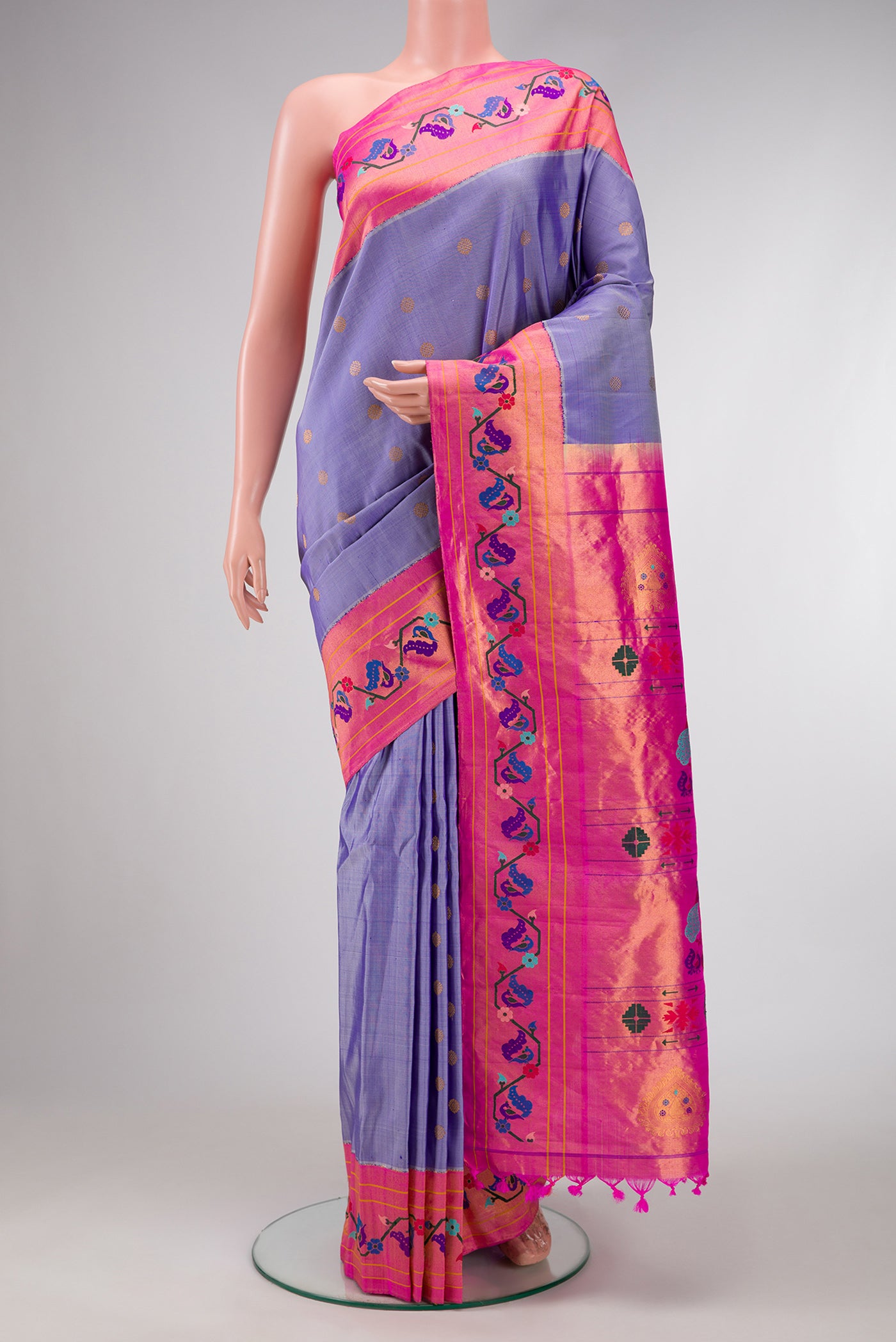 Lilac Dual Tone Gadwal Silk Saree with Zari Butta on the body and Paithani Border.  displayed on a mannequin