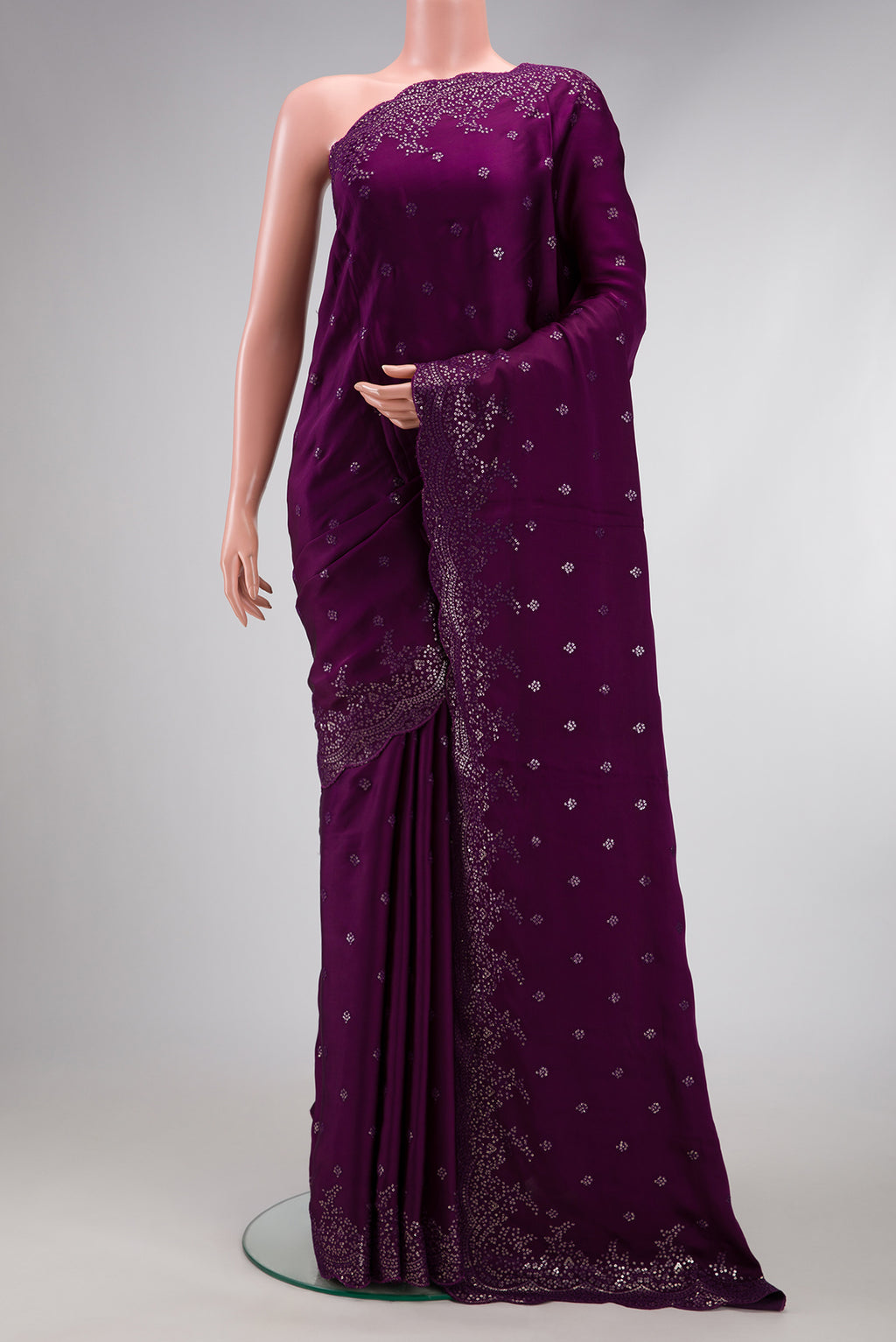Purple Dual Tone Crepe Saree with Embroidery on the body and Embroidery Border.  displayed on a mannequin