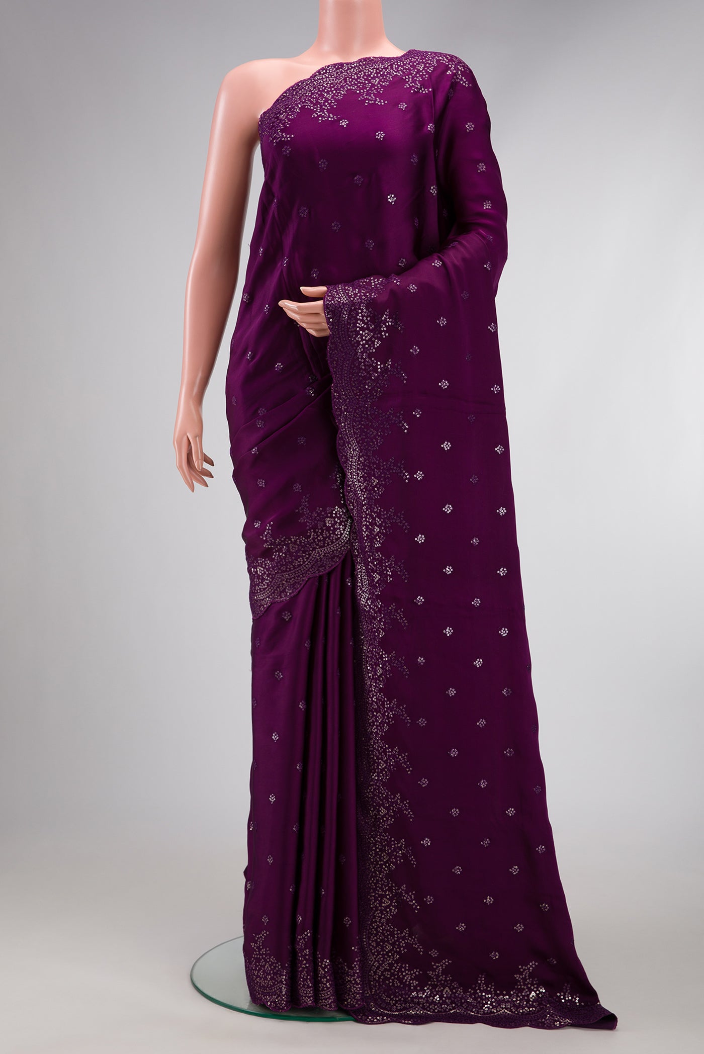 Purple Dual Tone Crepe Saree with Embroidery on the body and Embroidery Border.  displayed on a mannequin