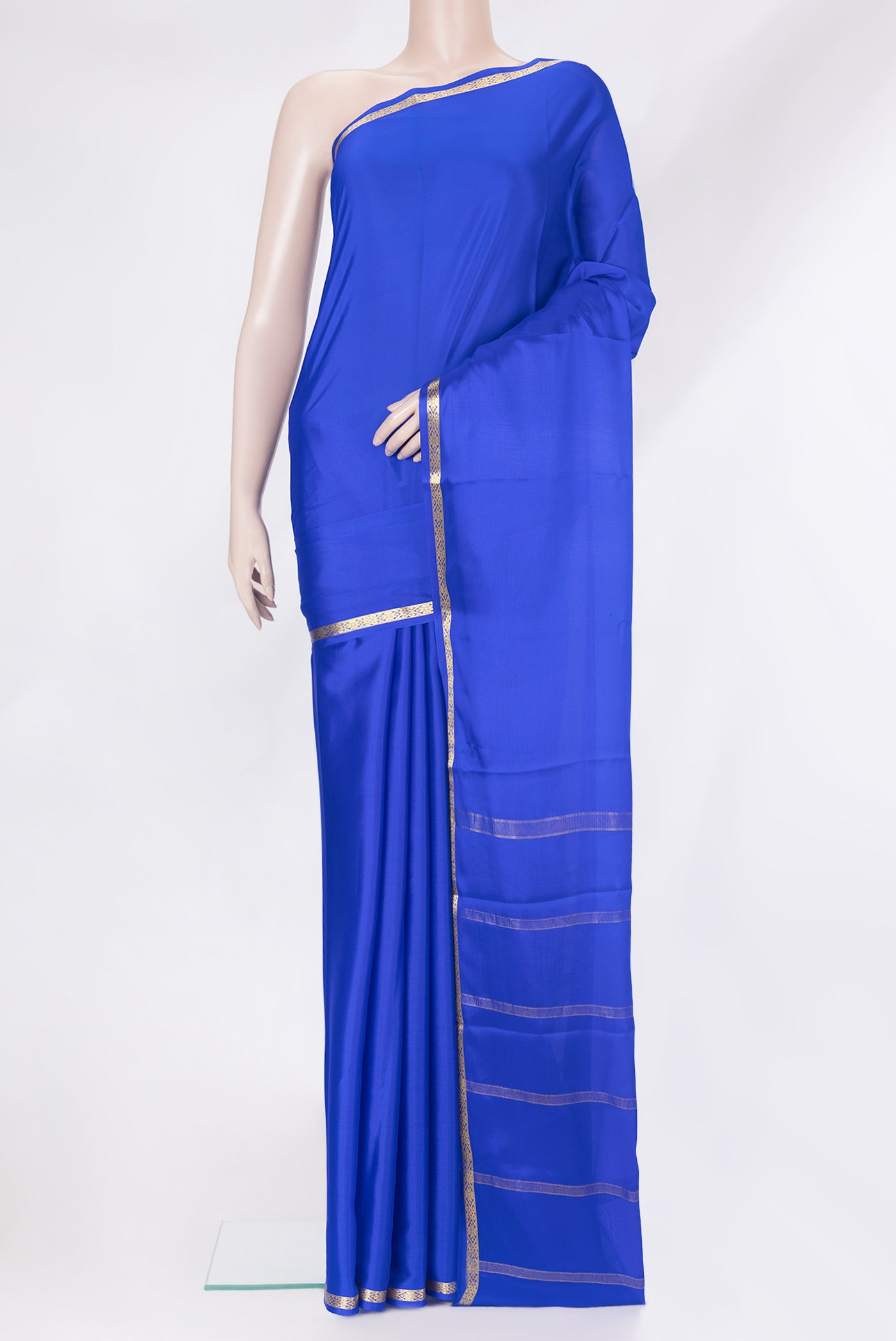 Royal Blue Mysore Silk Saree with Plain Body and Zari Border.  displayed on a mannequin