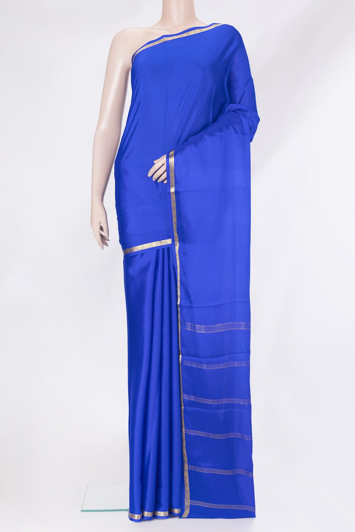 Royal Blue Mysore Silk Saree with Plain Body and Zari Border.  displayed on a mannequin