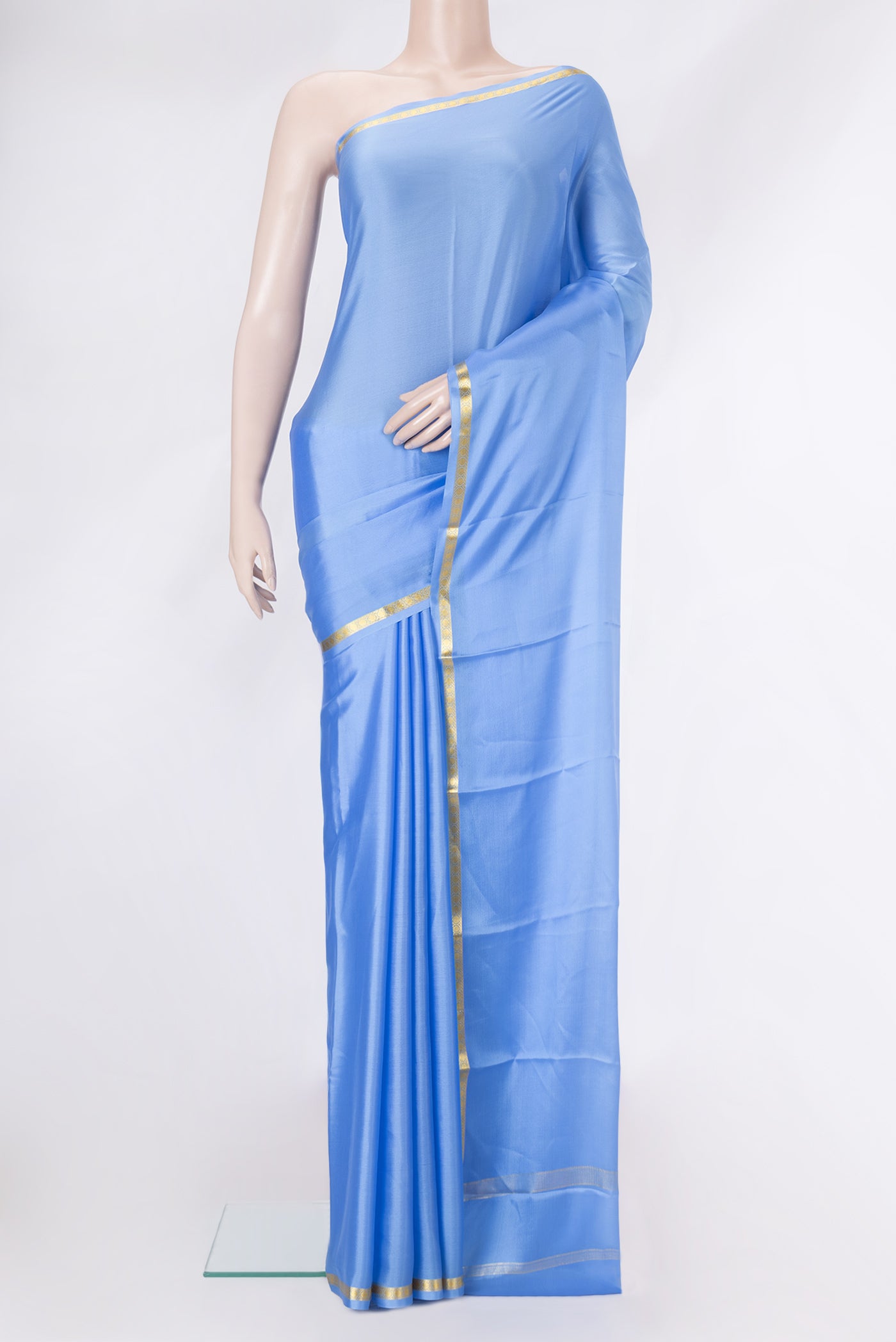 Light Blue Dual Tone Mysore Crepe Saree with Plain Body and Zari Border.  displayed on a mannequin