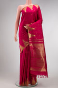 Maroon Dual Tone Kanchipuram Silk Saree with Zari Butta on the body and Temple Border.  displayed on a mannequin