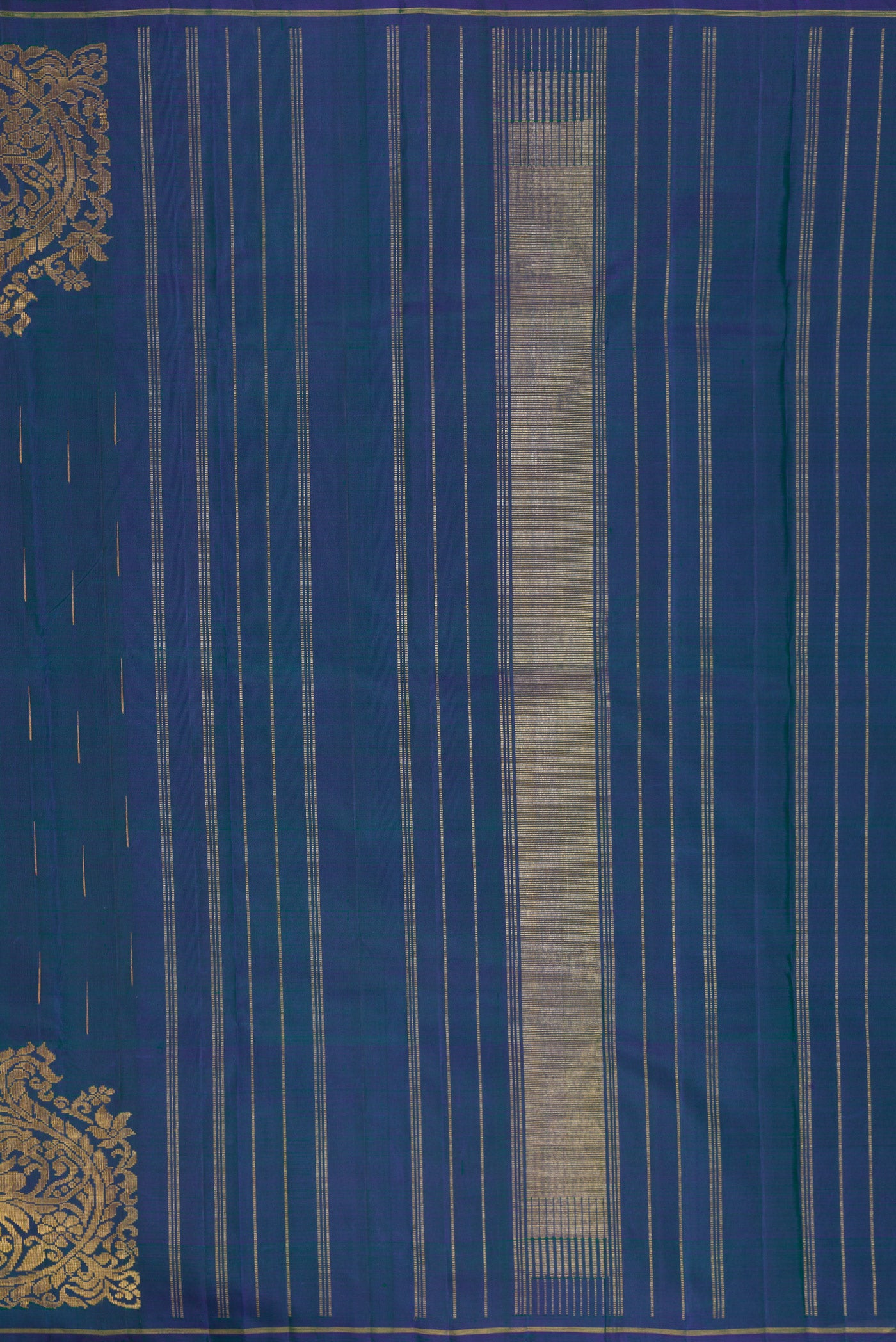 Close up image of the pallu of Peacock Blue Dual Tone Kanjivaram Silk Saree with Zari Butta on the body and Thin Zari Line. 