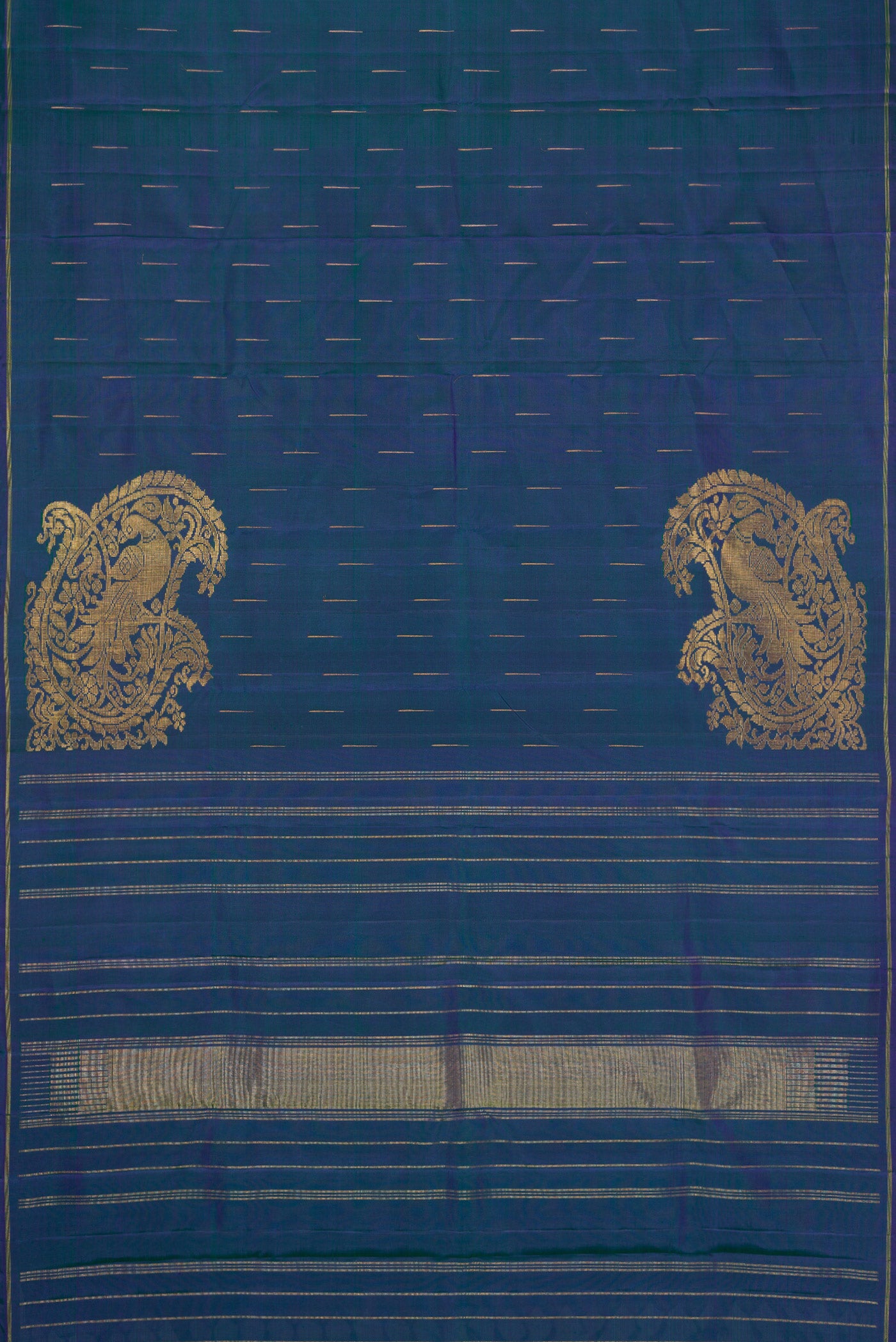 Flat view of Peacock Blue Dual Tone Kanjivaram Silk Saree with Zari Butta on the body and Thin Zari Line. 