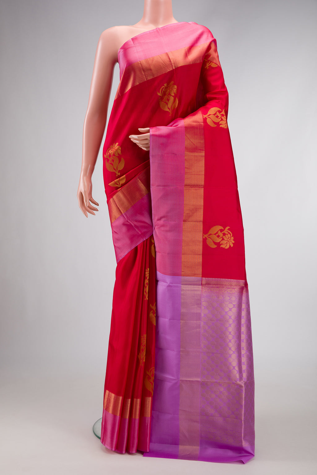 Red Dual Tone Soft Silk Saree with Zari Butta on the body and Zari Border.  displayed on a mannequin