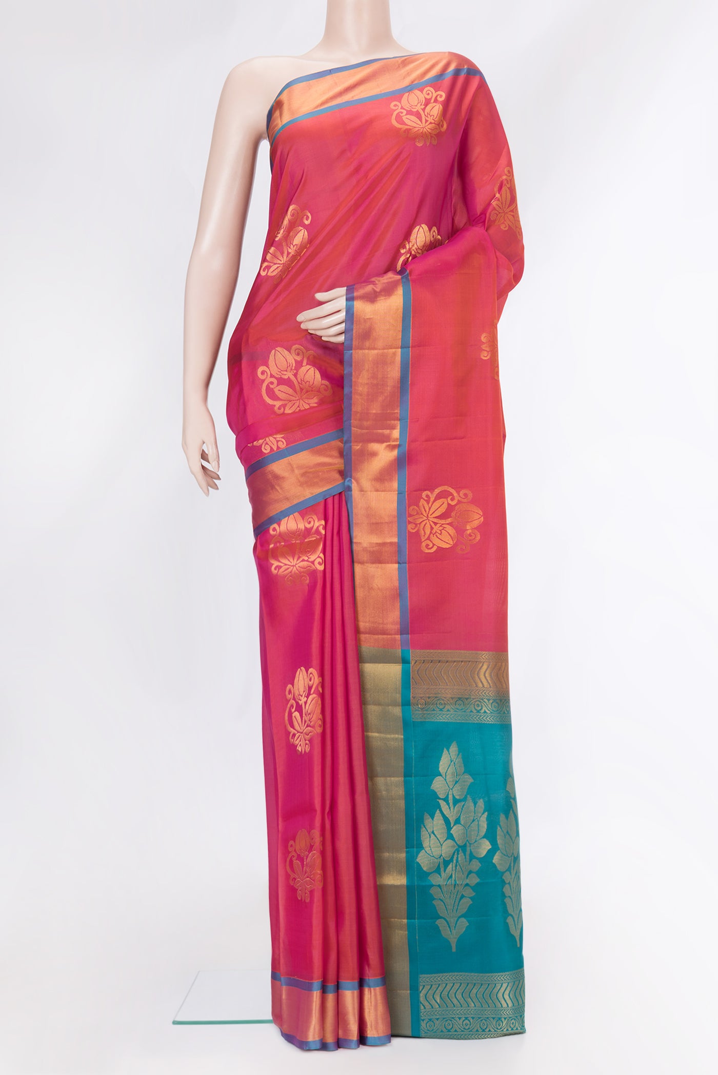 Pink Dual Tone Soft Silk Saree with Zari Butta on the body and Zari Border.  displayed on a mannequin