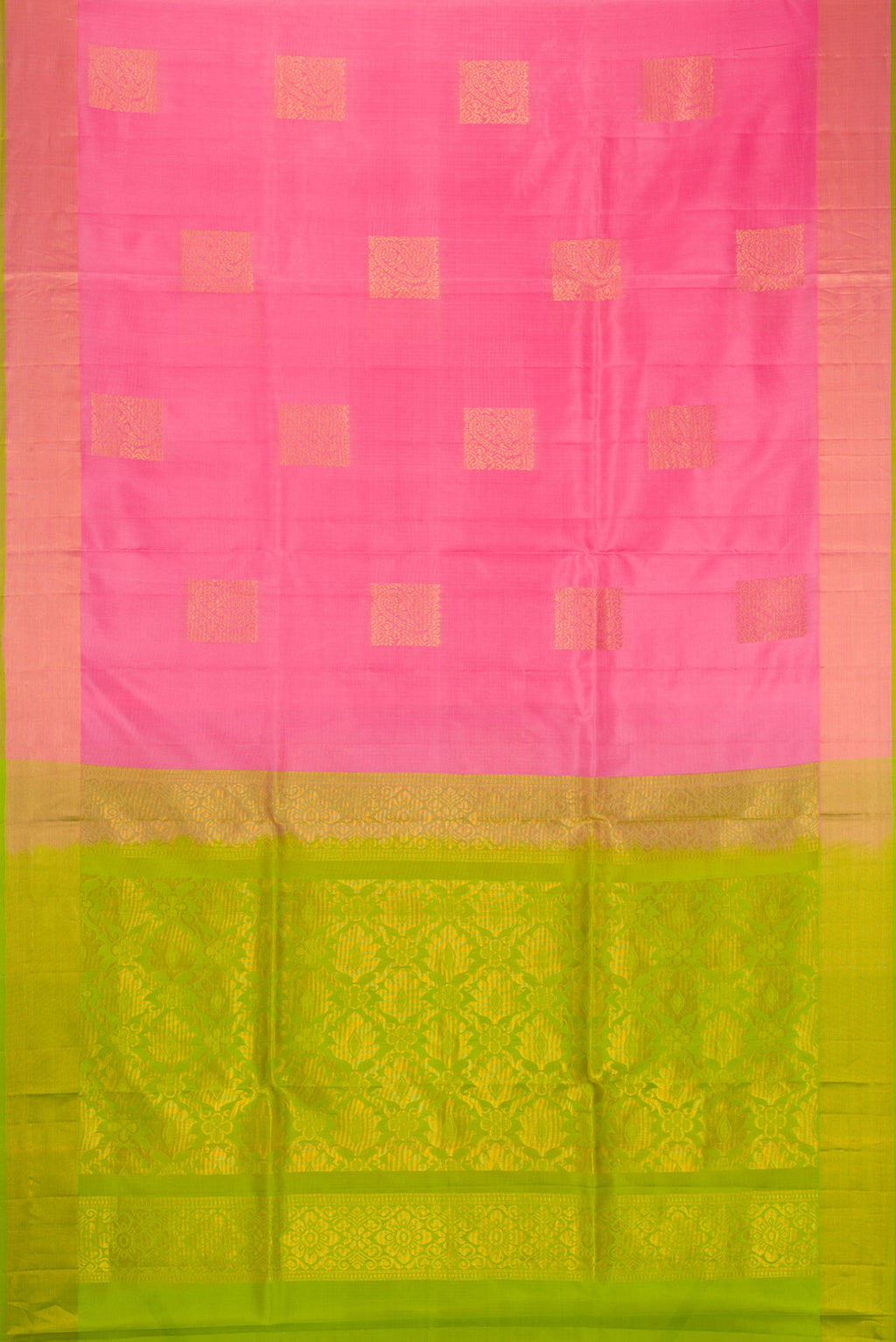 Flat view of Pink Soft Silk Saree with Zari Butta on the body and Zari Border. 
