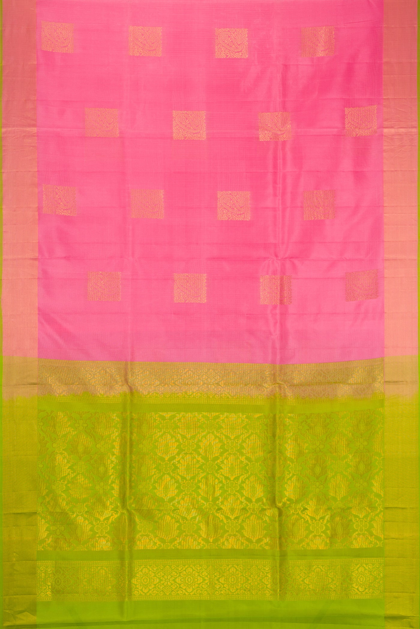Flat view of Pink Soft Silk Saree with Zari Butta on the body and Zari Border. 
