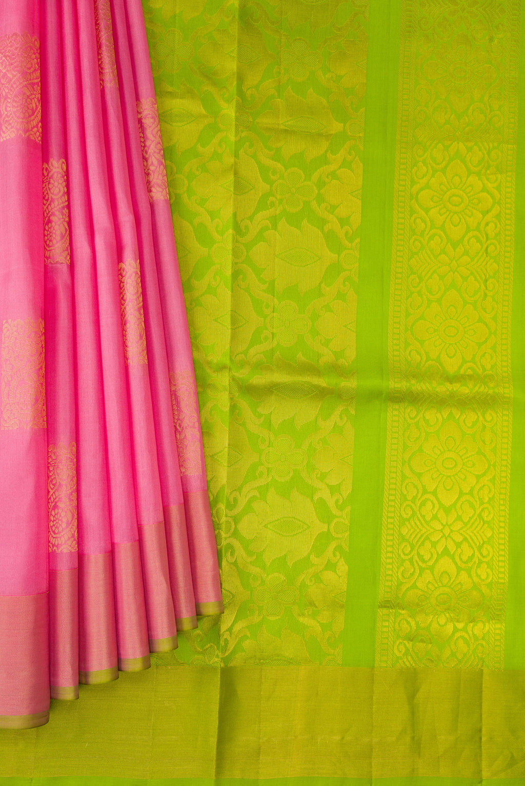 Pleats and pallu of Pink Soft Silk Saree with Zari Butta on the body and Zari Border. 