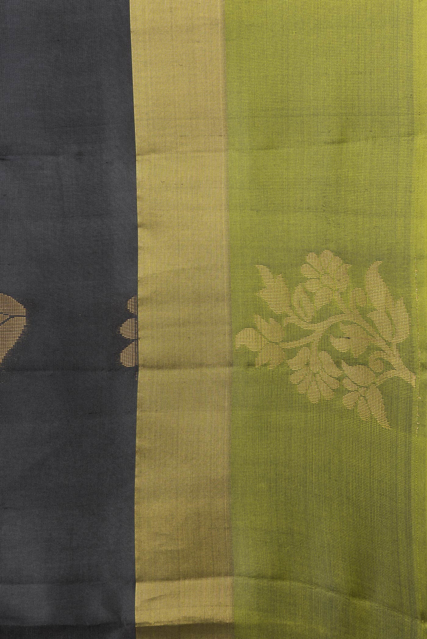 Border image of Black Dual Tone Soft Silk Saree with Zari Butta on the body and Fancy Border. 