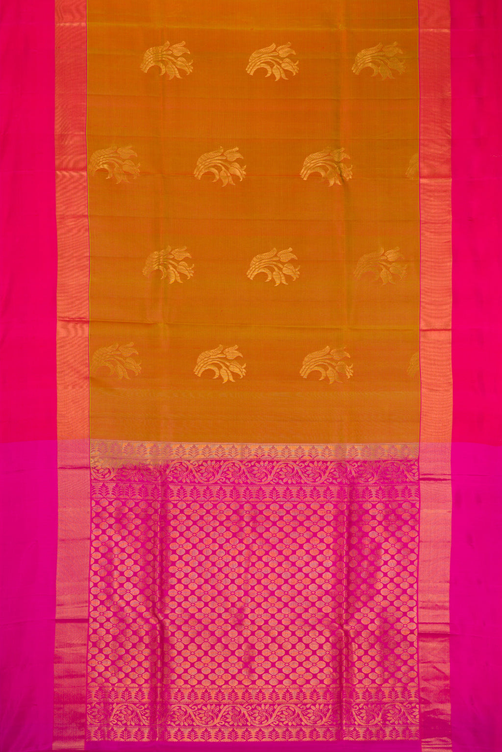 Multi Color Soft Silk Saree with Zari Butta on the body and Zari Border.  displayed on a mannequin