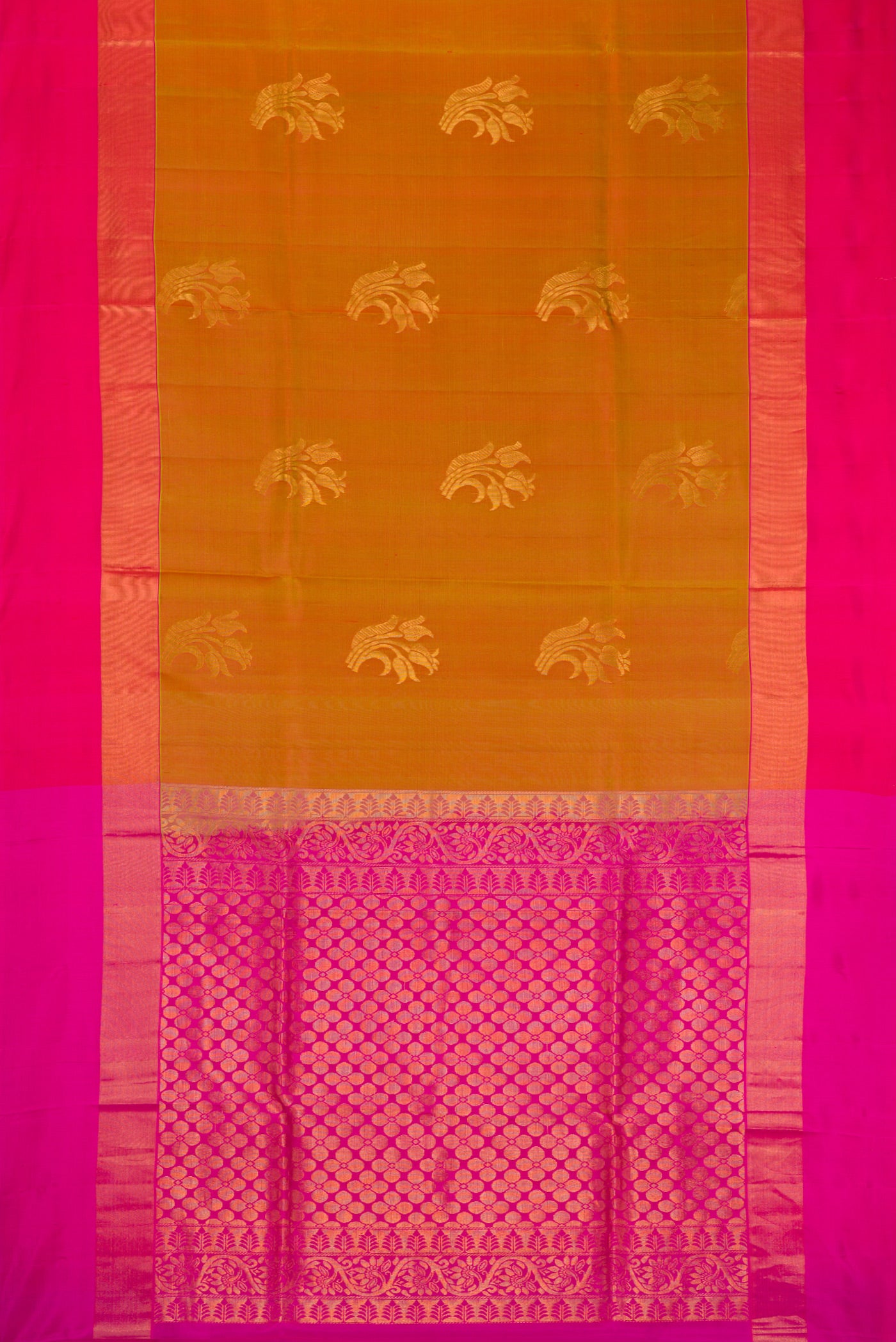 Multi Color Soft Silk Saree with Zari Butta on the body and Zari Border.  displayed on a mannequin