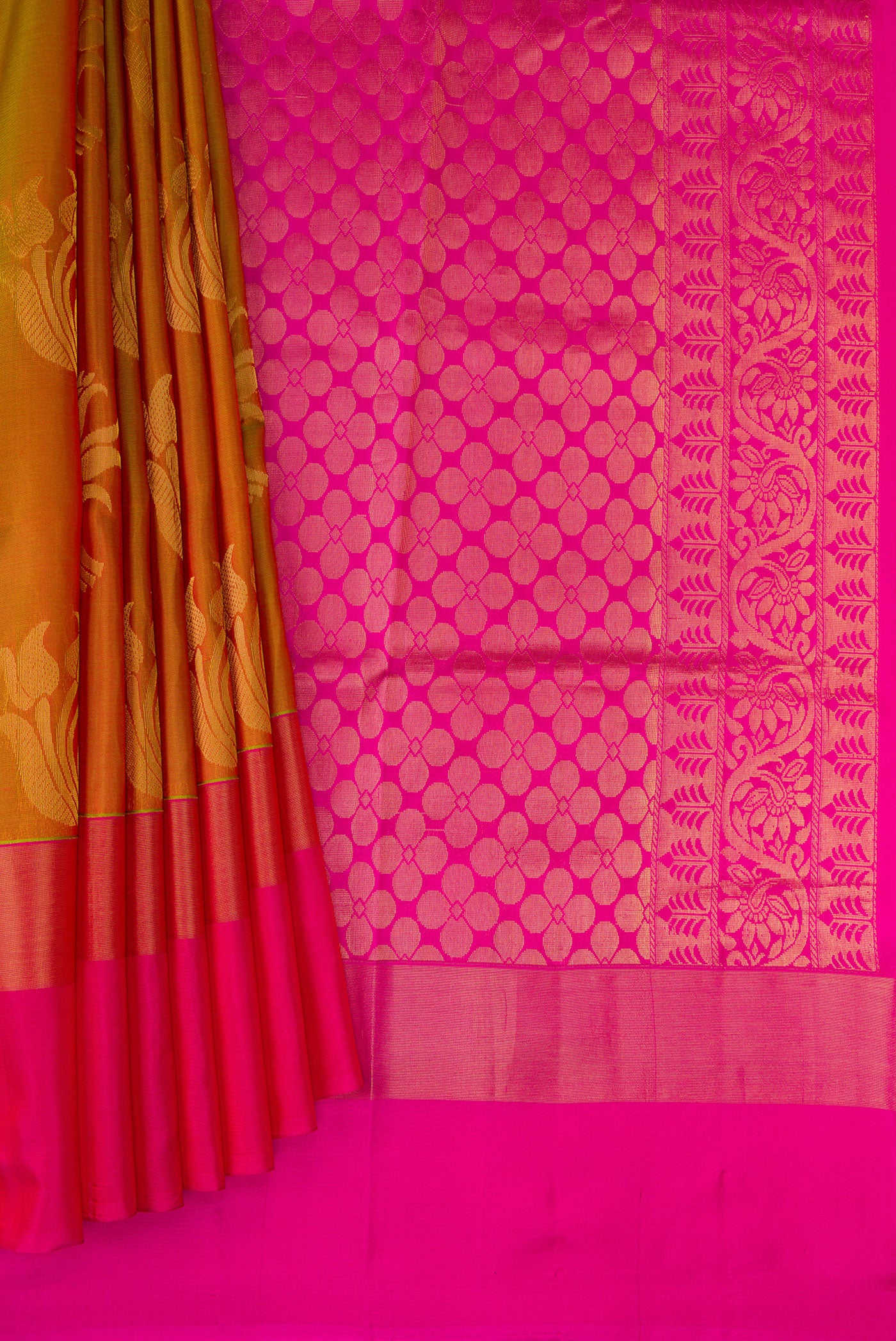 Pleats and pallu of Multi Color Soft Silk Saree with Zari Butta on the body and Zari Border. 